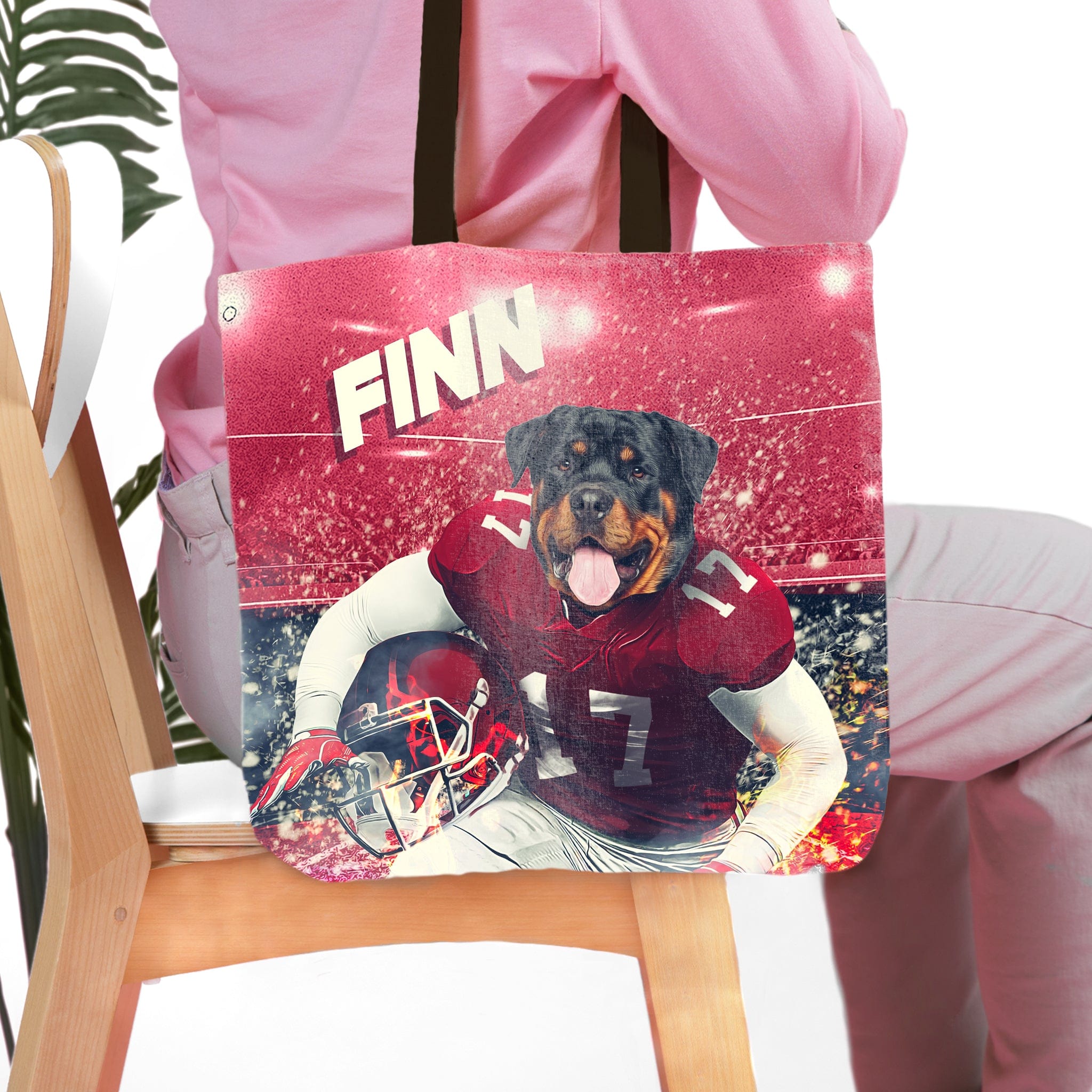 Personalized tote bag with a Rottweiler pet portrait in a football uniform, red stadium background, and "FINN" text.