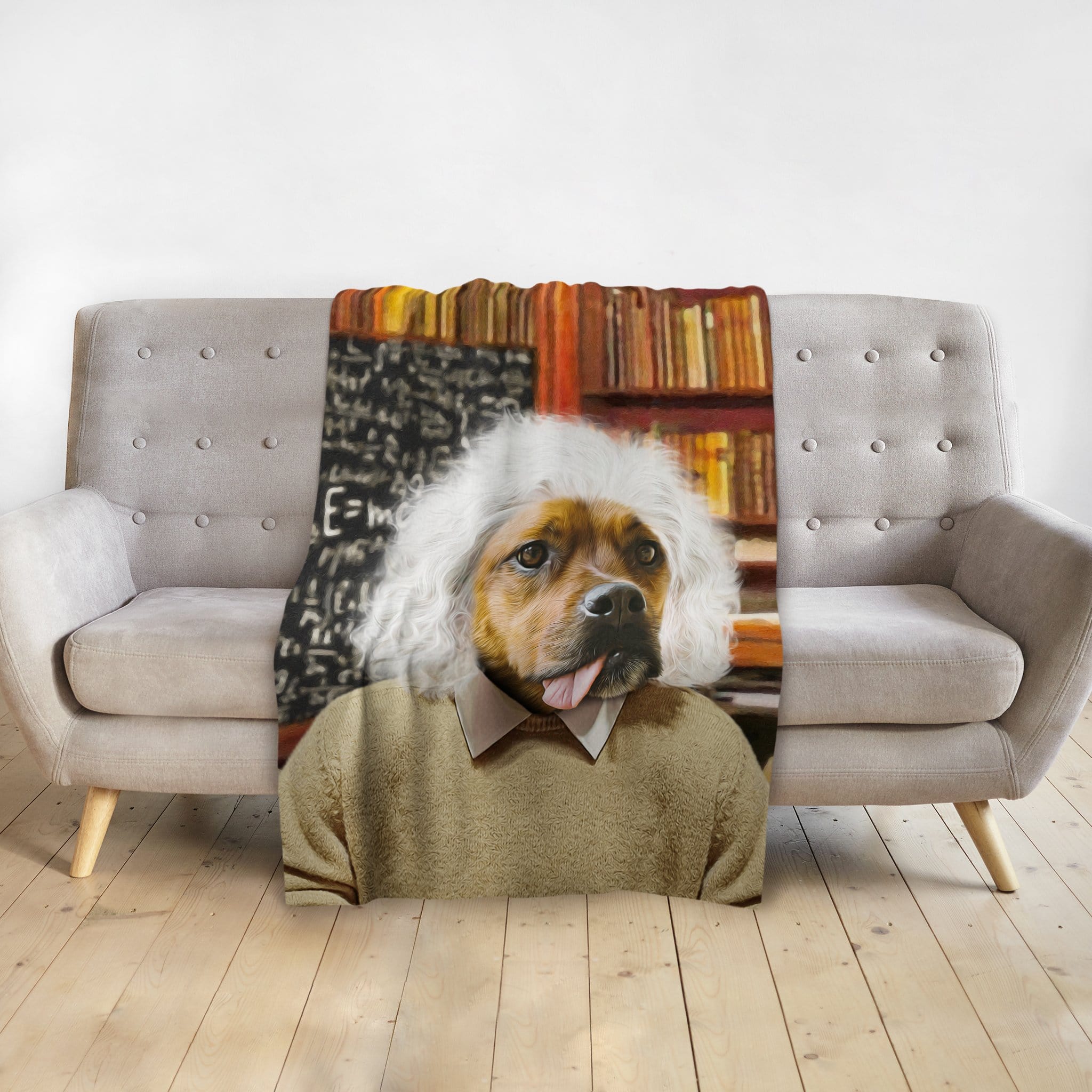 Custom pet blanket with a Doggovinci portrait of a dog as Albert Einstein, draped over a gray sofa.