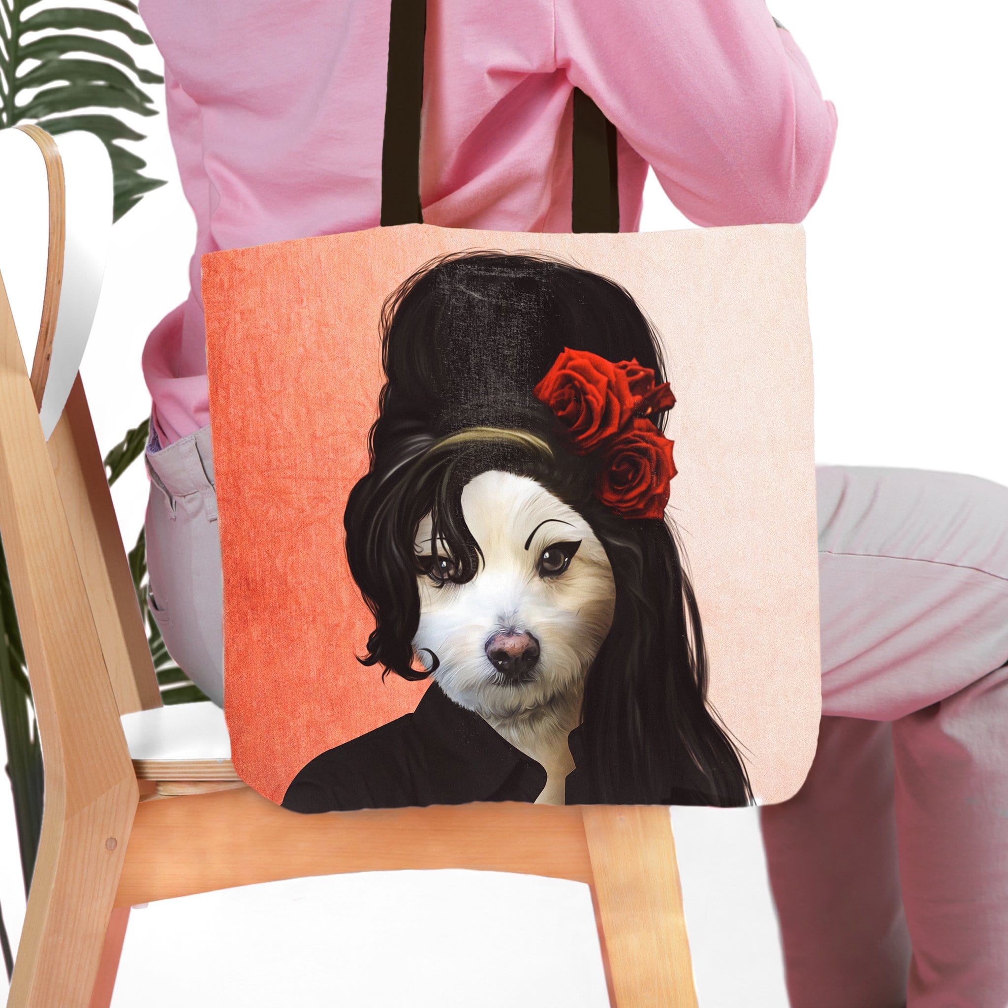 Personalized tote bag with a custom pet portrait of a white dog in a black beehive wig with red roses.
