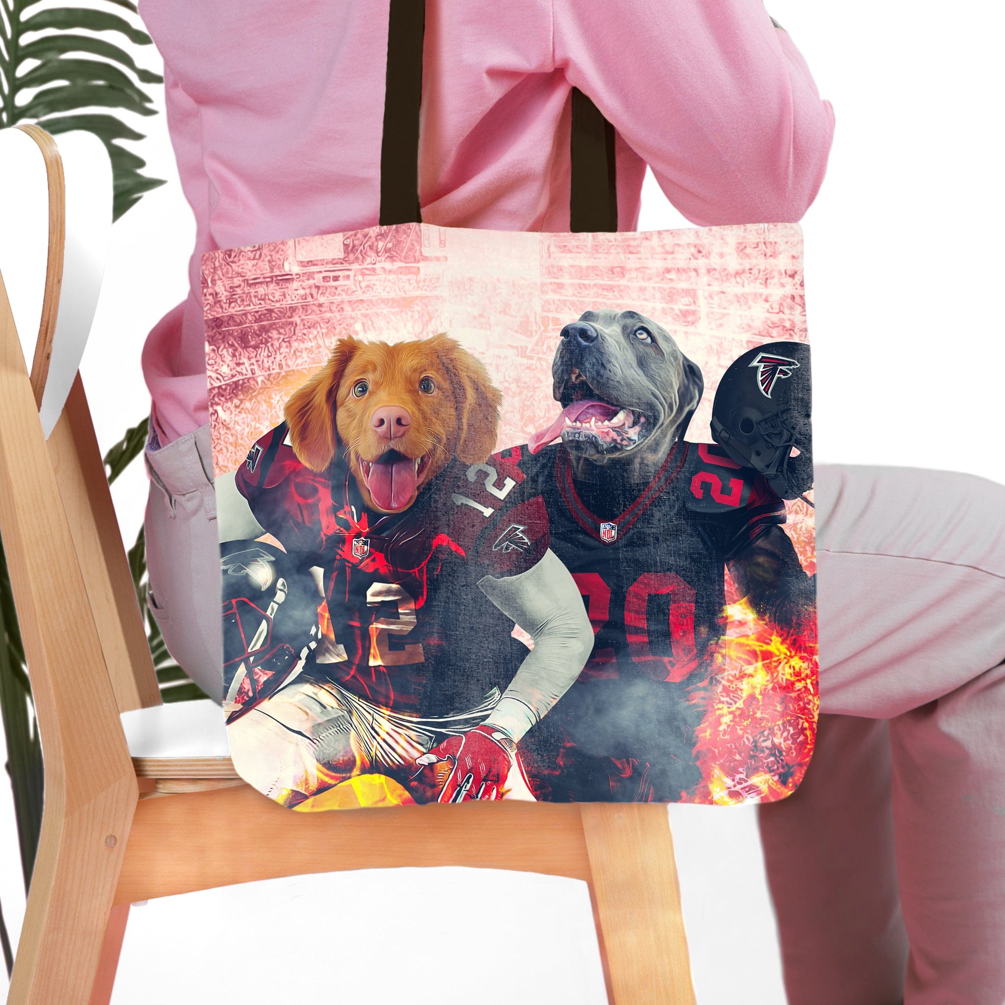 Personalized 2-pet tote bag with dogs in Atlanta Falcons football uniforms, fiery background.
