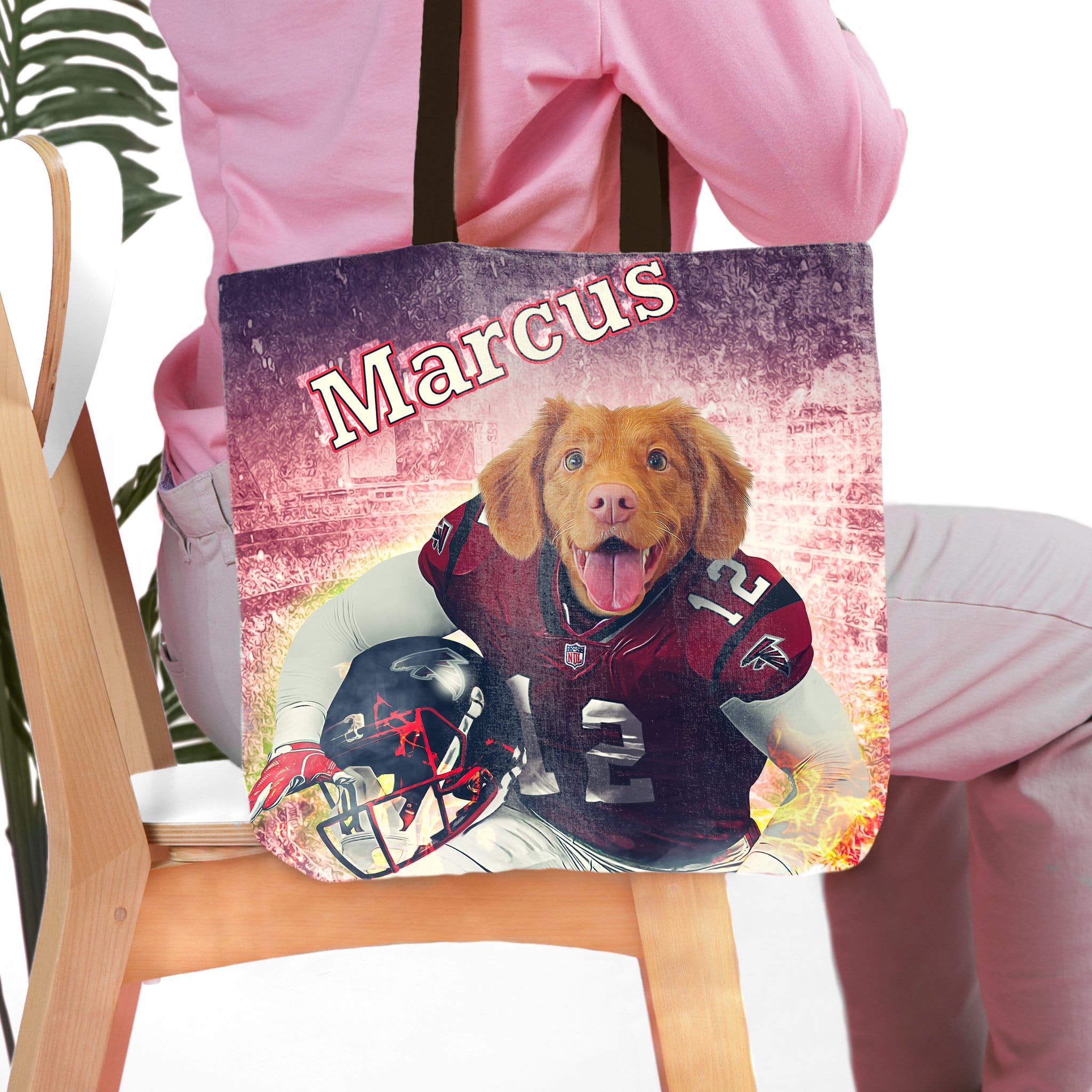 Personalized tote bag with a dog in an Atlanta Falcons football uniform and the name "Marcus.