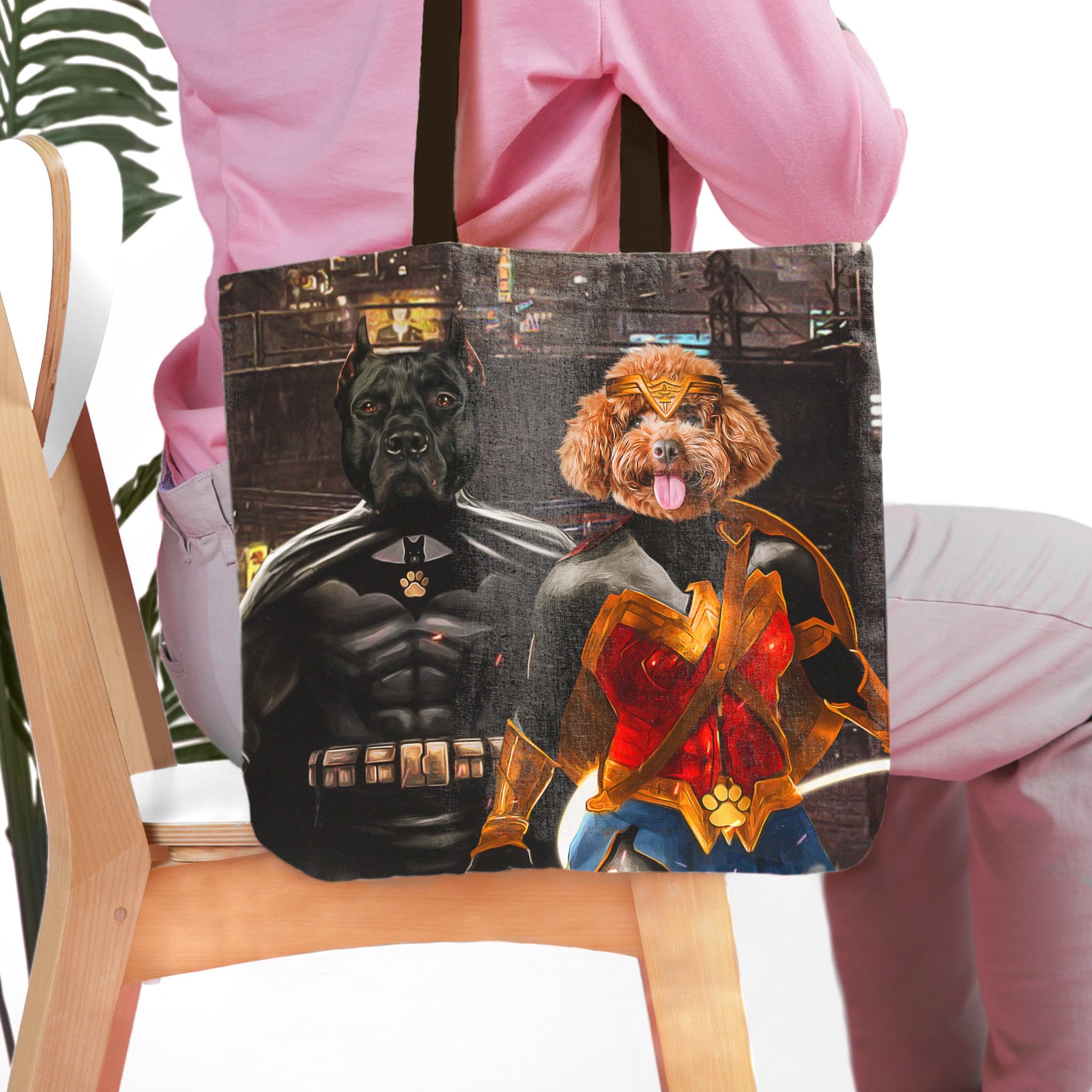 Personalized 2-pet tote bag featuring a black dog as Batdog and a brown dog as Wonder Doggette.