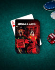 Custom playing card with two personalized dog portraits in red soccer jerseys on a green felt table.