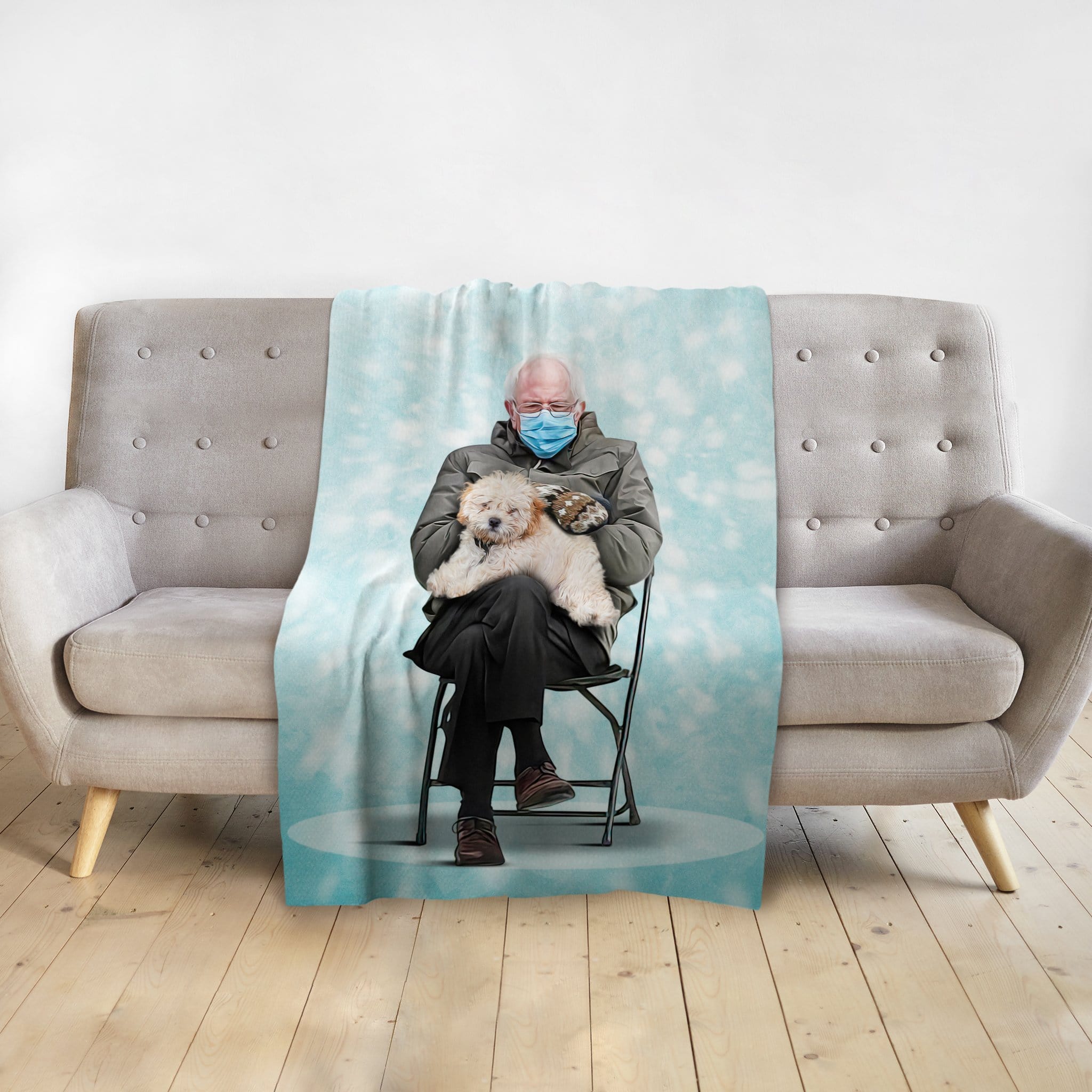 Personalized blanket featuring a custom portrait of Bernie Sanders holding a fluffy dog.