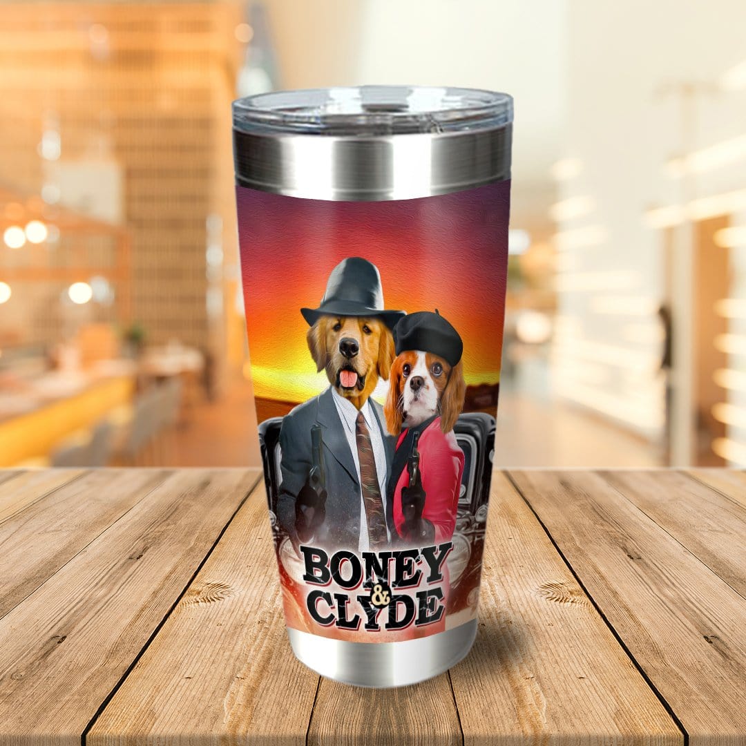 Personalized stainless steel tumbler with two dogs dressed as "Boney & Clyde" in a sunset scene.