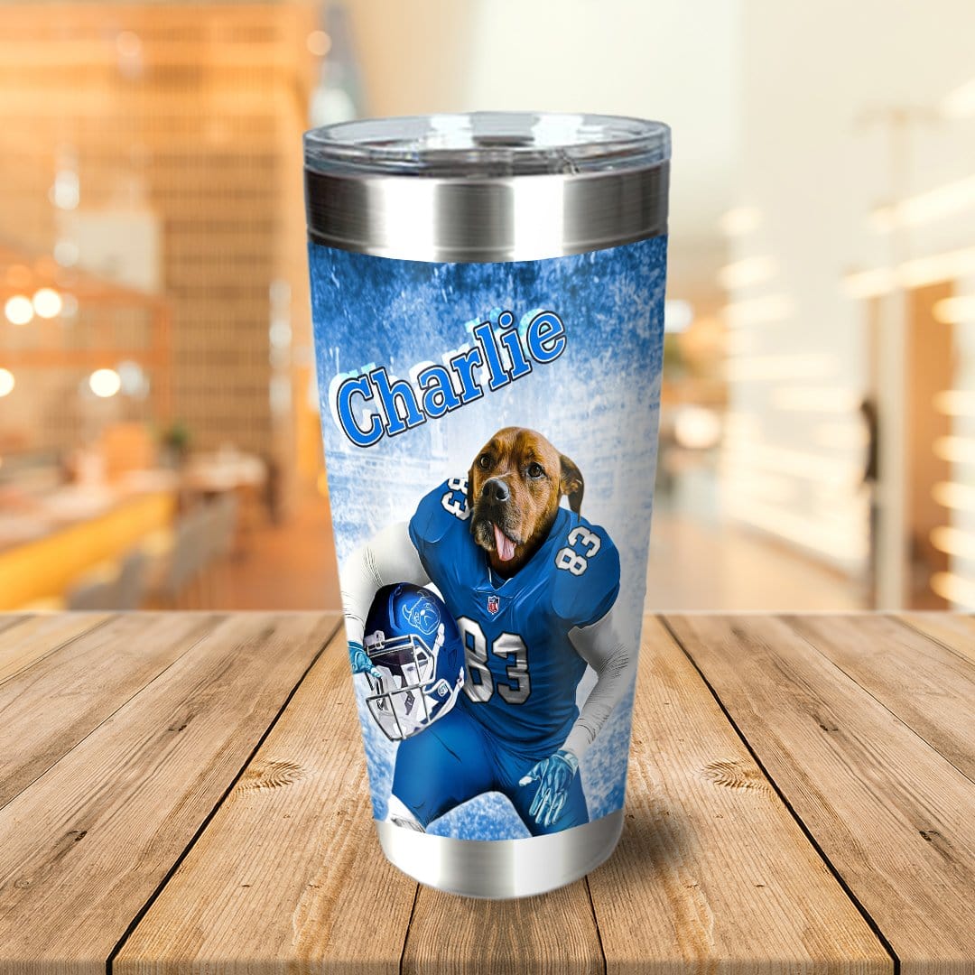 Personalized stainless steel tumbler with a dog in a blue football uniform, named Charlie.