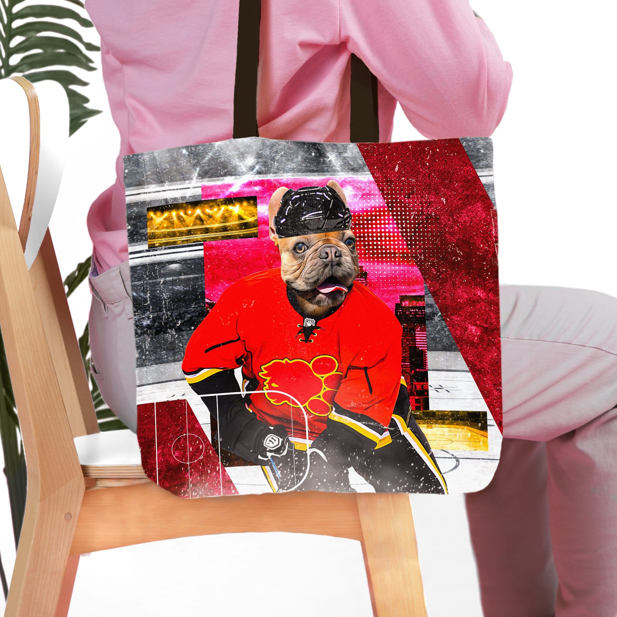 Personalized tote bag with a custom French Bulldog pet portrait in a Calgary Flames hockey uniform.
