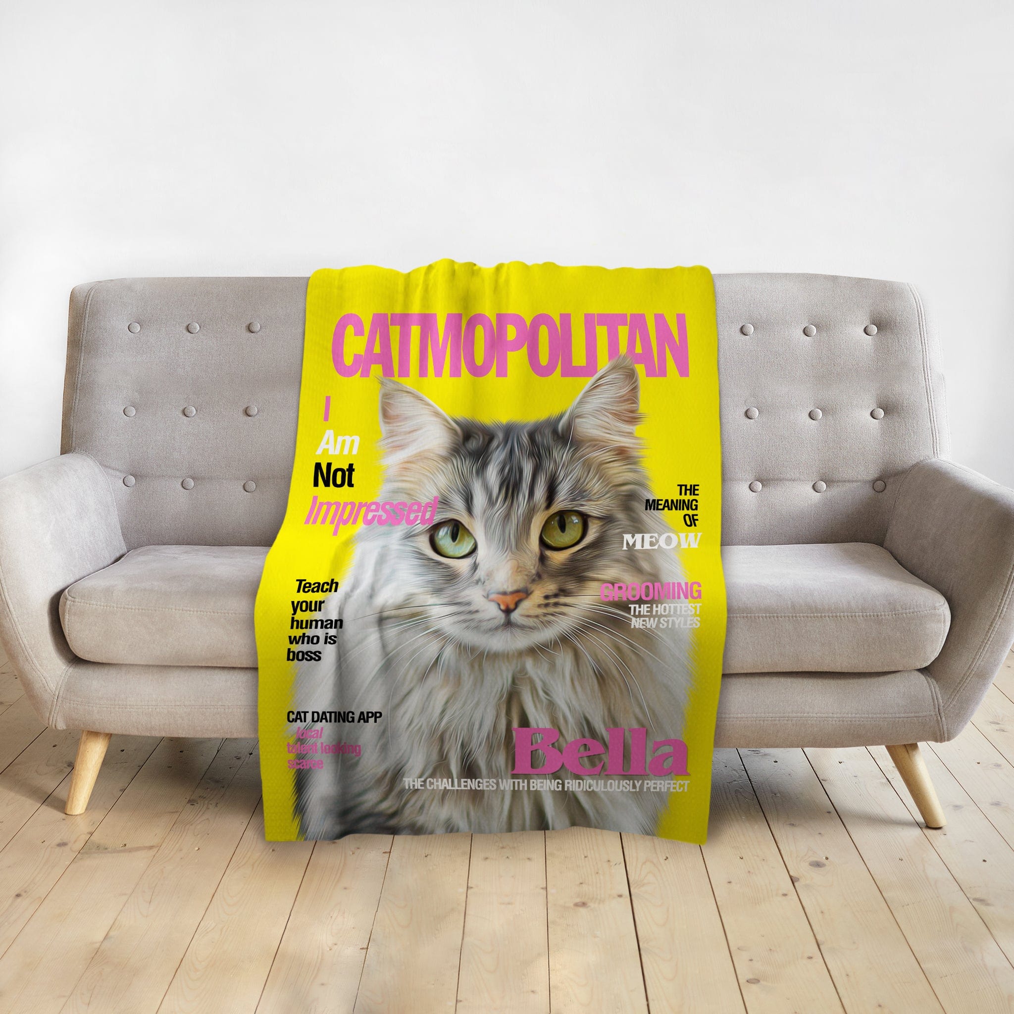 Personalized Catmopolitan pet blanket with a custom portrait of a fluffy grey cat.