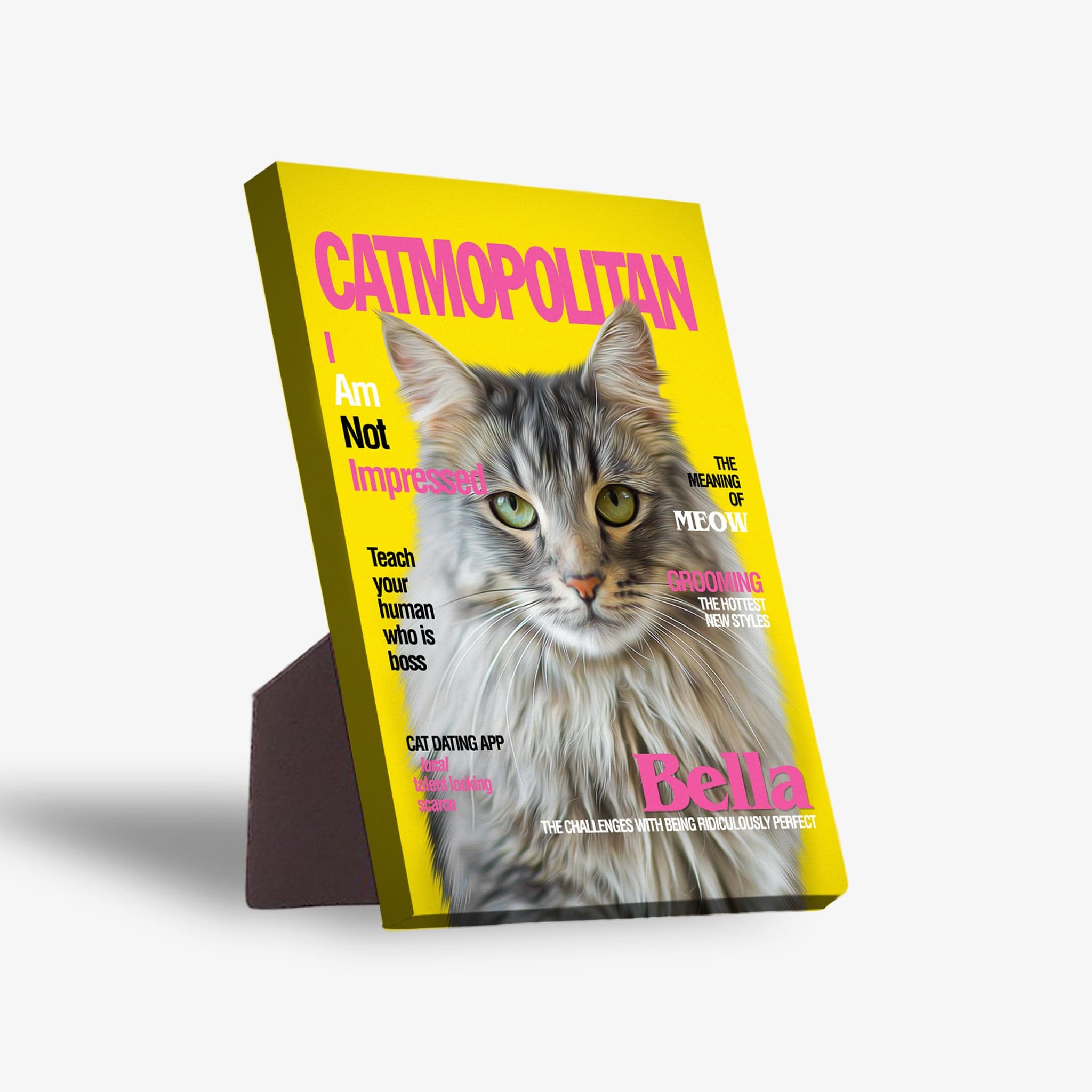 Personalized 'Catmopolitan' standing canvas featuring a grey cat portrait on a yellow magazine cover.