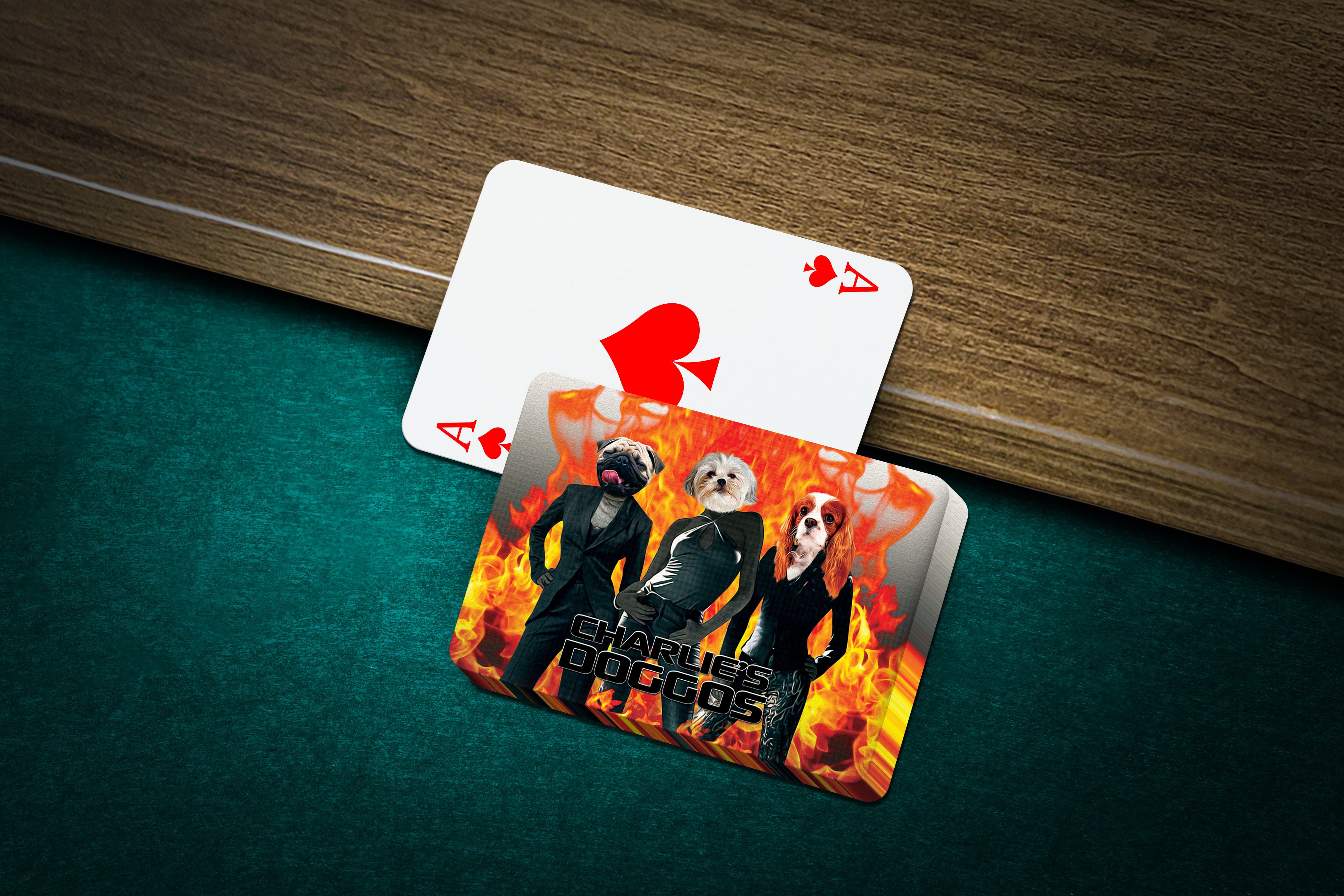 Personalized playing cards featuring three dogs in suits with a fiery background, next to an Ace of Spades.