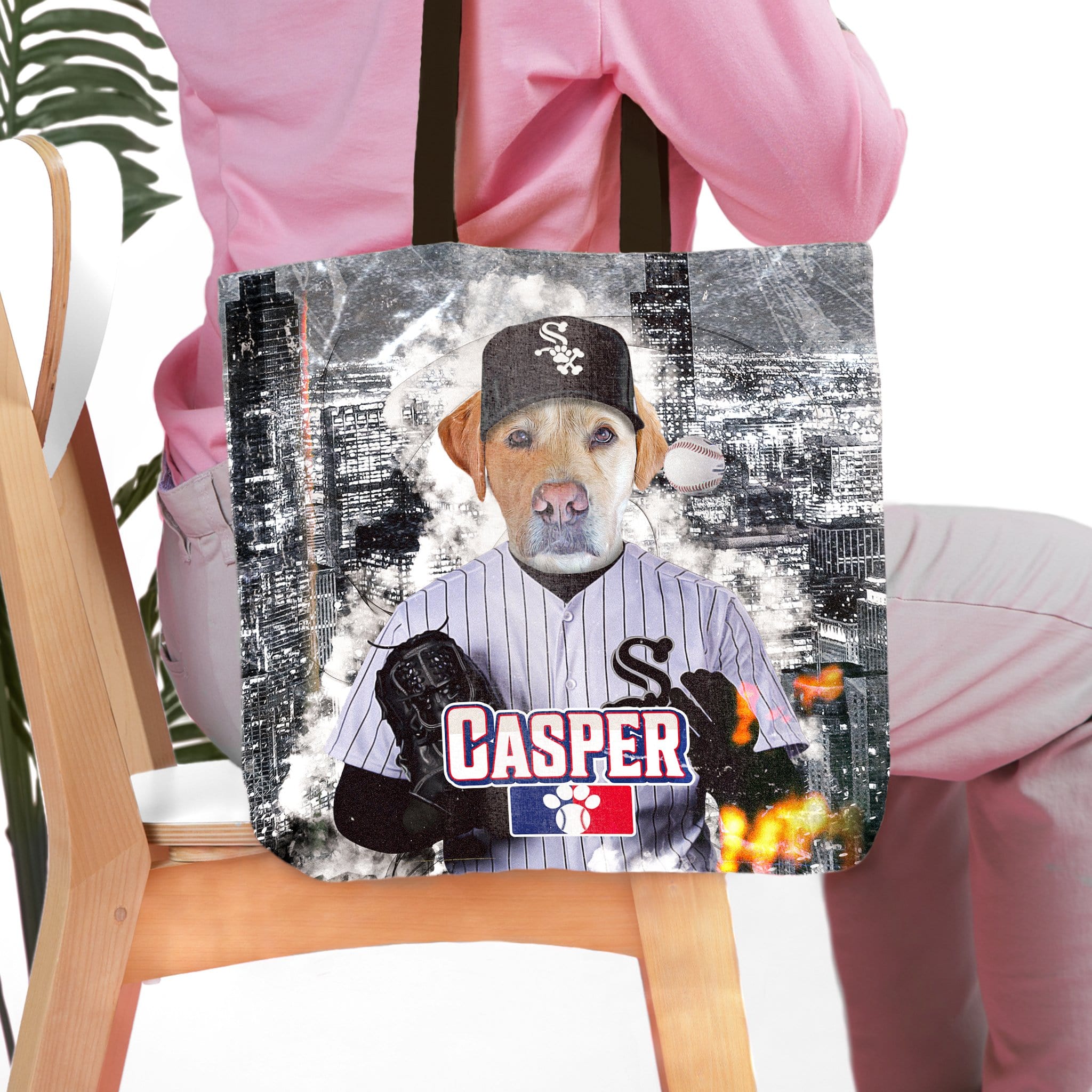 Personalized pet portrait tote bag featuring a dog in a baseball uniform with a city skyline background.