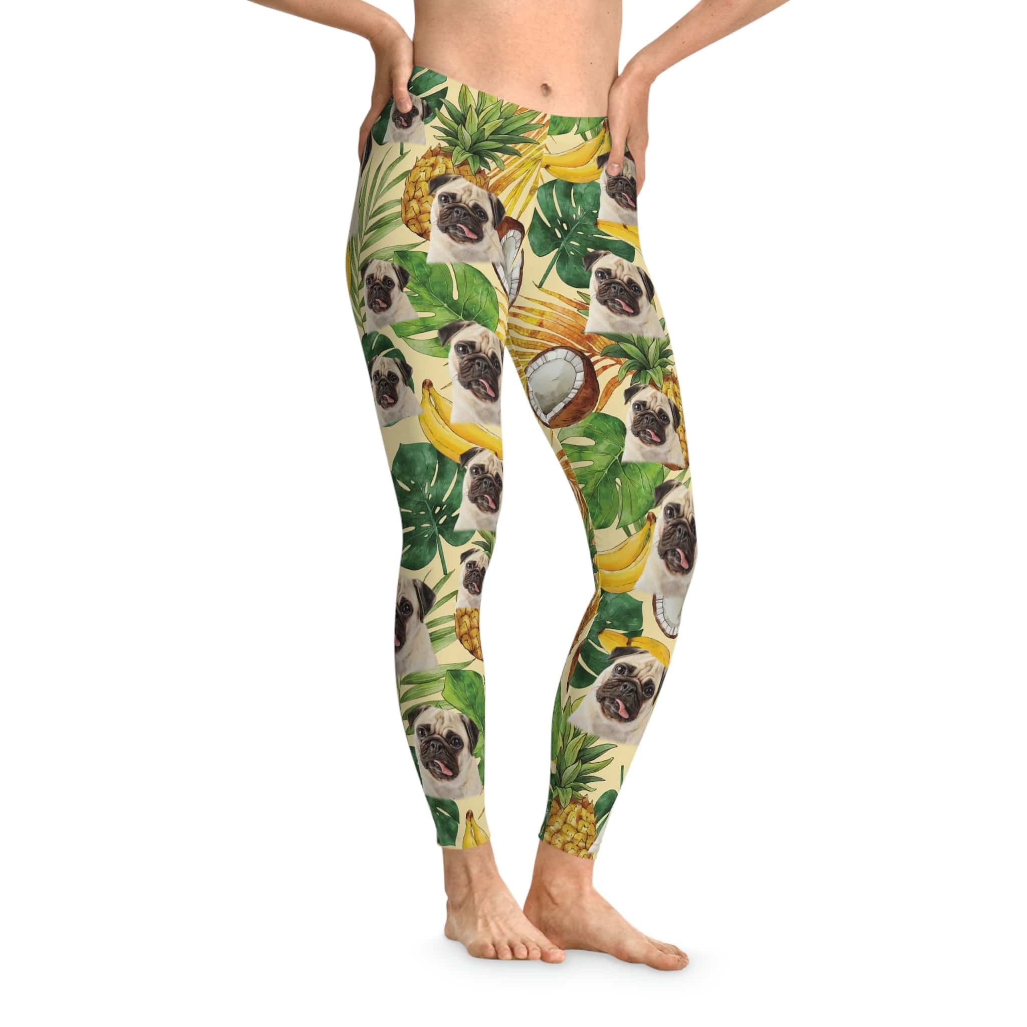 Custom tropical yellow leggings with pug faces, pineapples, bananas, and palm leaves.