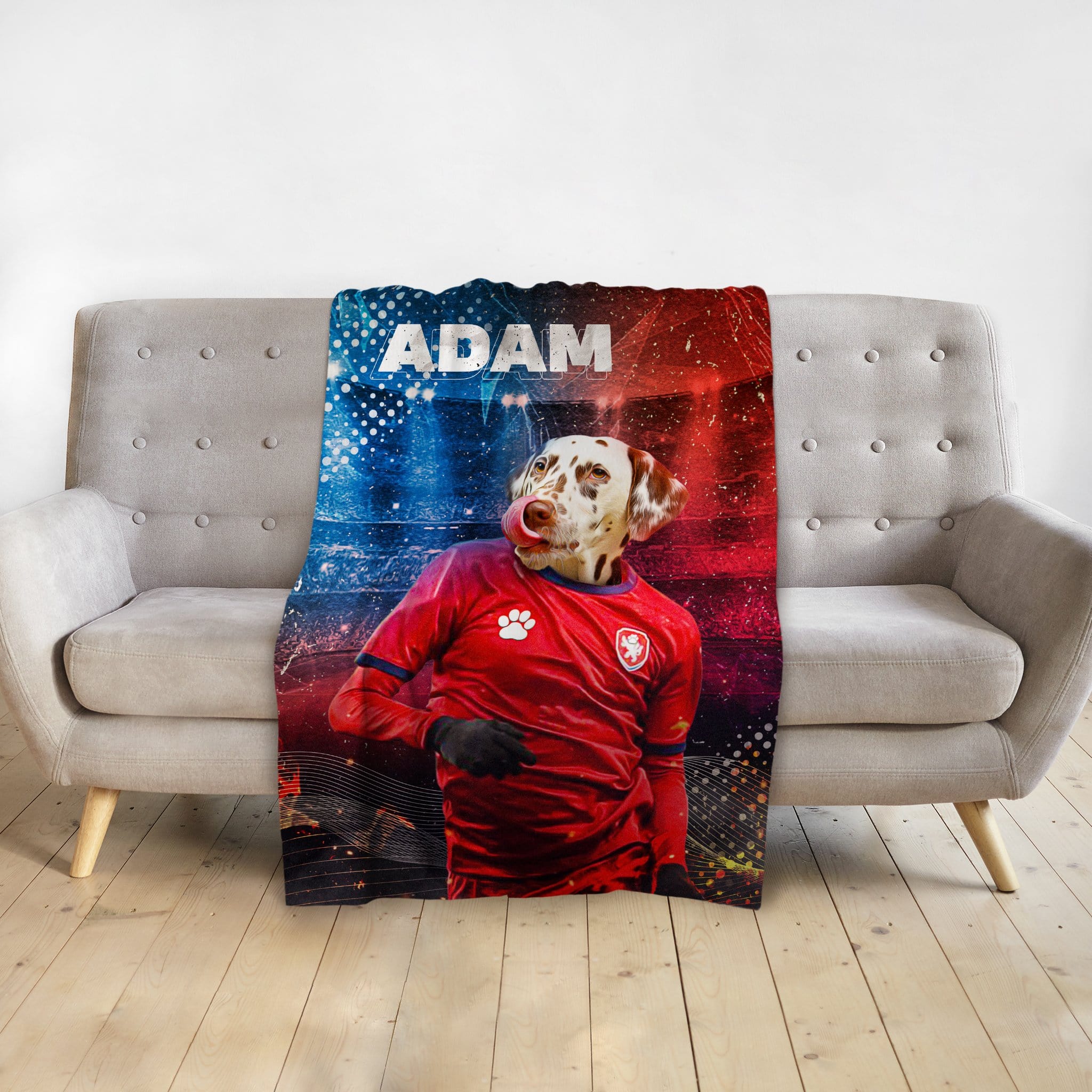 Personalized pet blanket with a Dalmatian dog in a red soccer jersey, name 'ADAM' above.