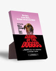 Personalized "Dawn of the Doggos" standing canvas featuring a pet portrait on a pink and black movie poster design.