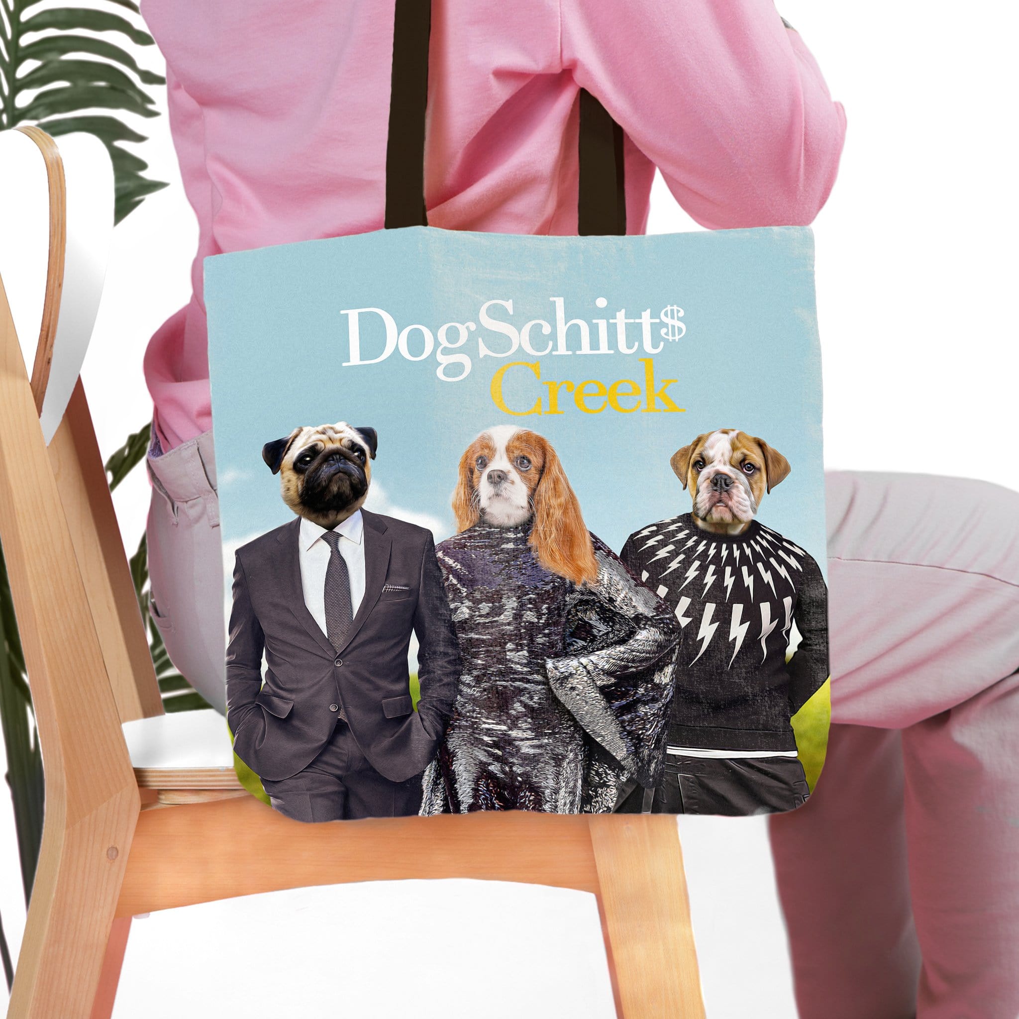Personalized DogSchitt's Creek tote bag with three custom pet portraits: a pug, a Cavalier King Charles Spaniel, and a bulldog.