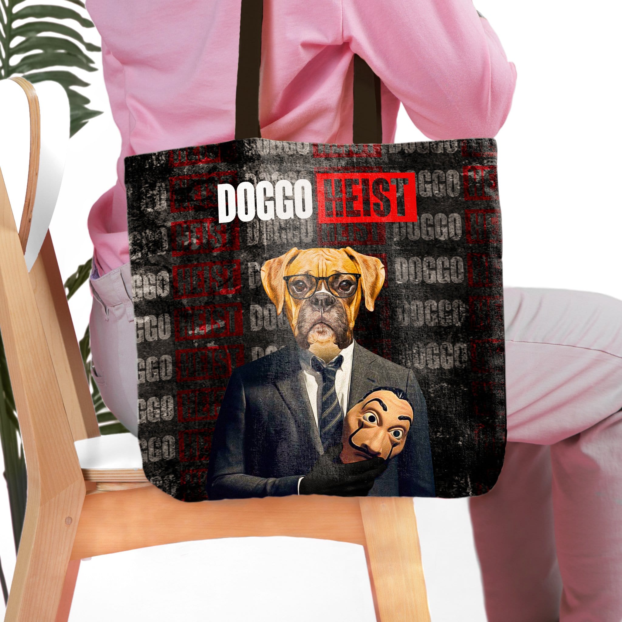 Personalized 'Doggo Heist' tote bag with a custom pet portrait of a boxer dog in a suit holding a mask.
