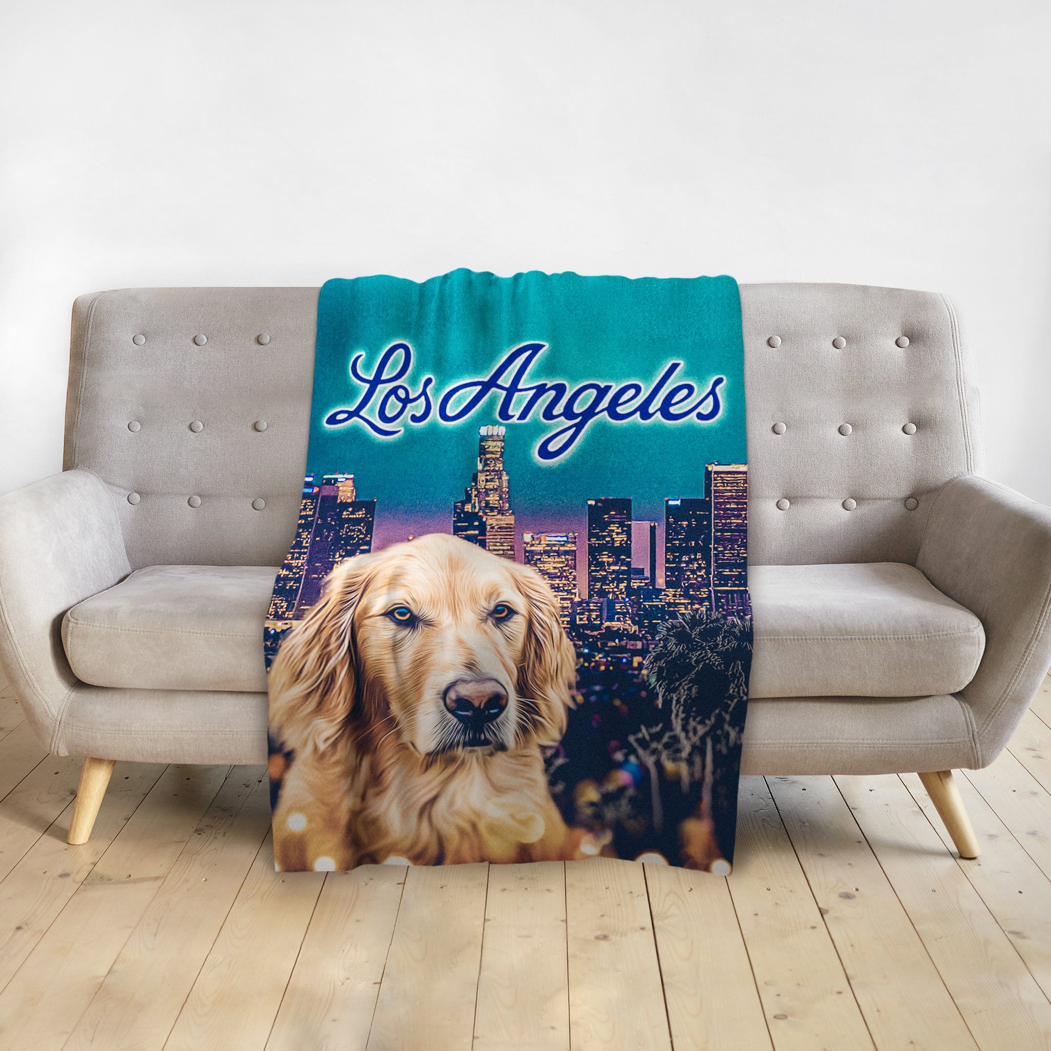 Personalized pet blanket with a golden retriever portrait and Los Angeles skyline.