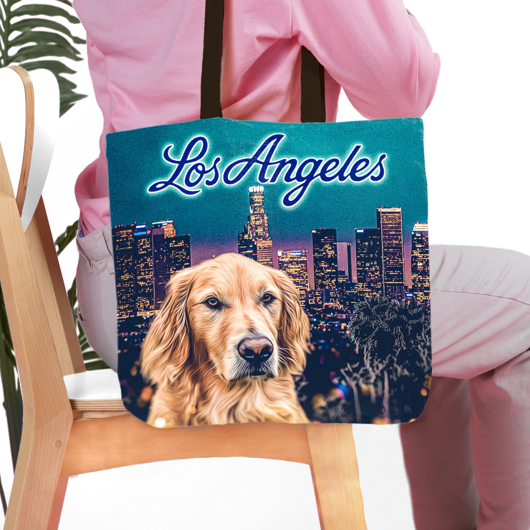 Personalized tote bag with a golden retriever dog portrait over a Los Angeles skyline.