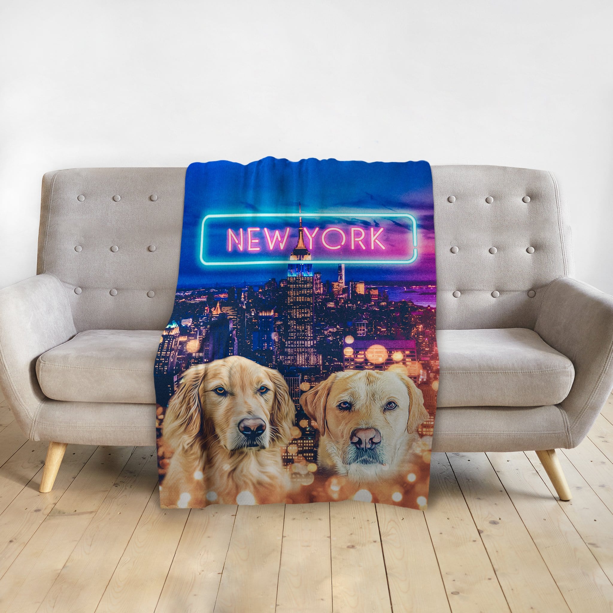 Personalized blanket with two golden retriever dog portraits and a New York City skyline at night.