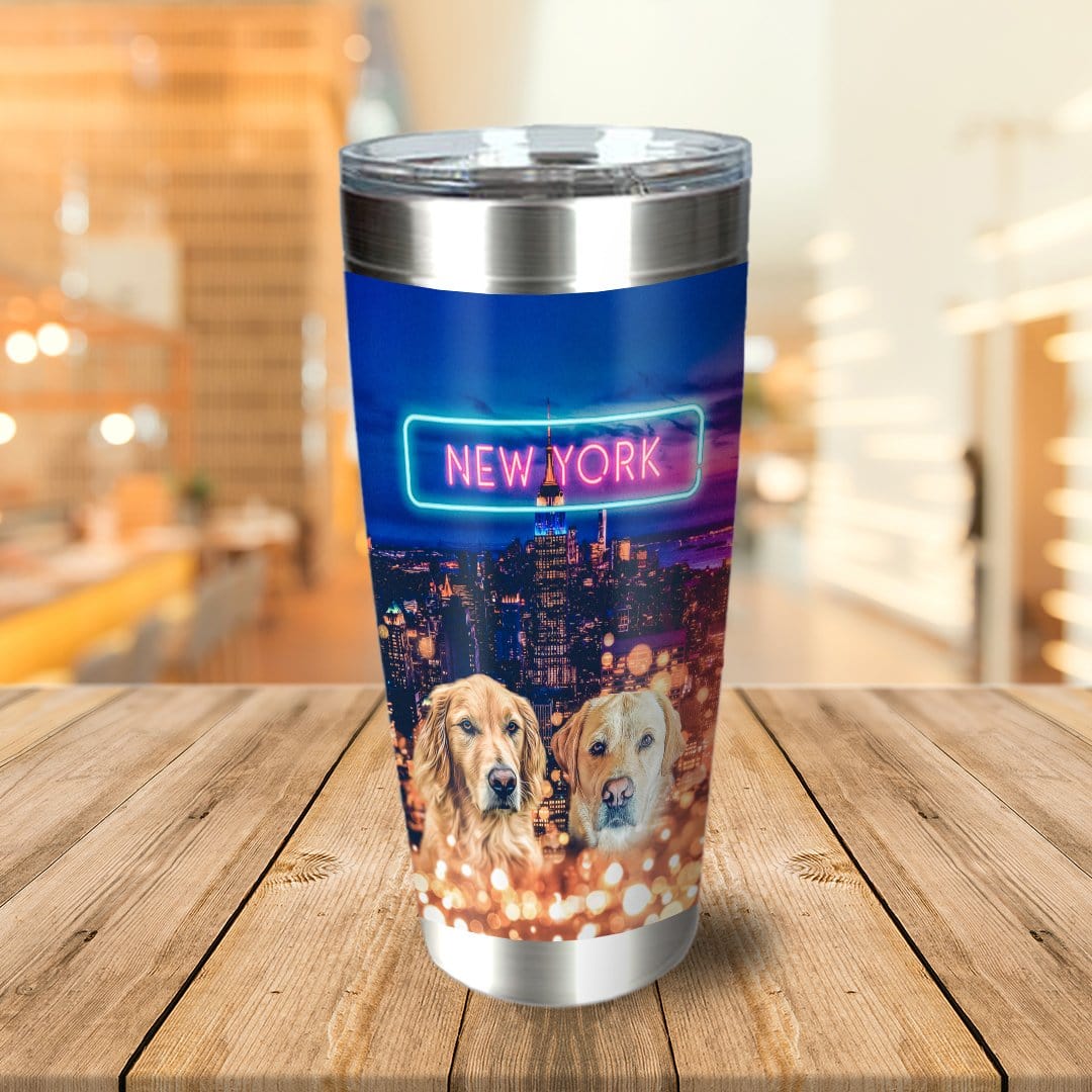 Personalized stainless steel tumbler with two dog portraits over a New York city skyline.