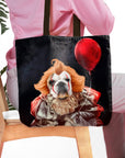 Personalized black tote bag with a custom pet portrait of a bulldog dressed as Pennywise holding a red balloon.
