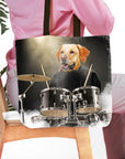 Personalized tote bag with a custom pet portrait of a dog playing drums.