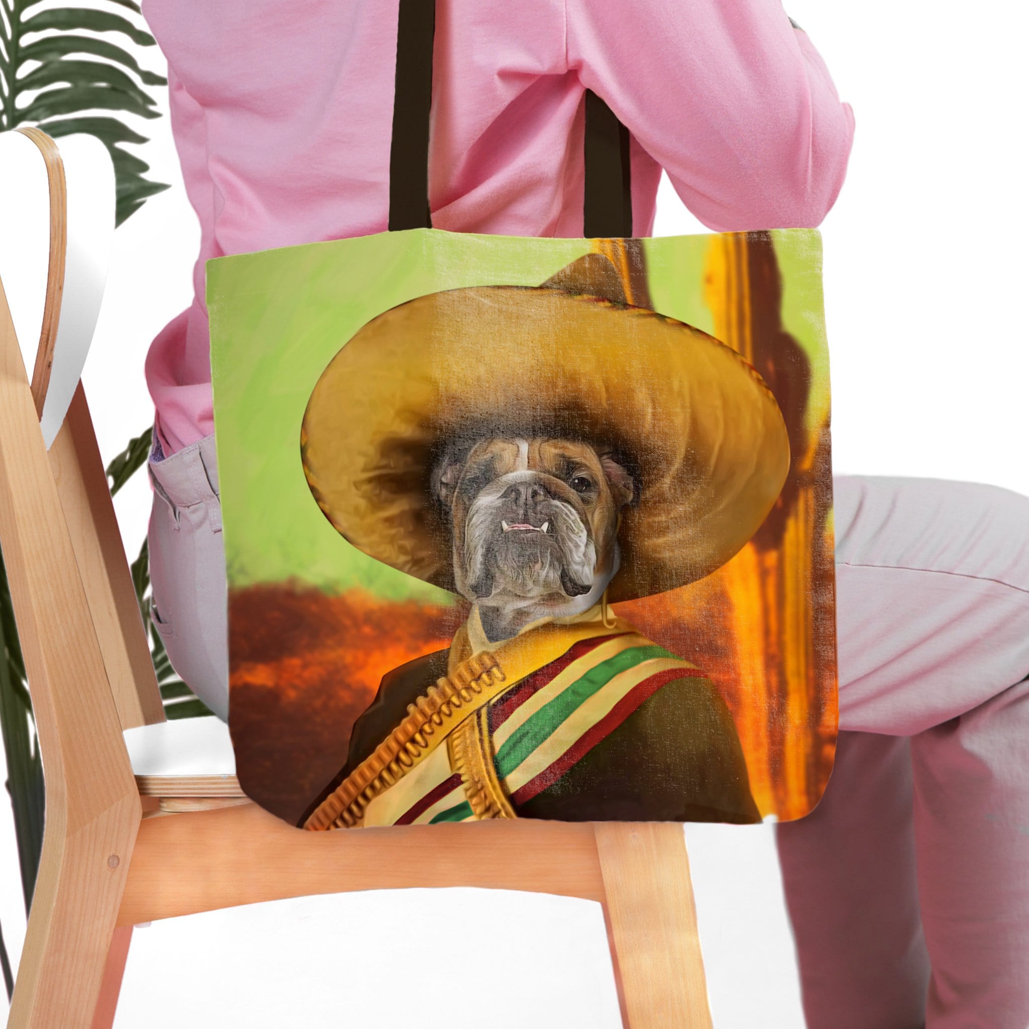 Personalized pet portrait tote bag featuring a bulldog in a sombrero and royal attire.