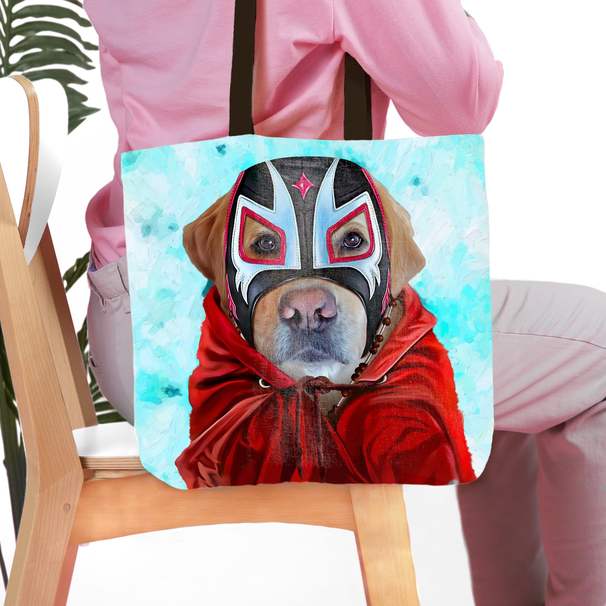 Personalized pet tote bag with a golden retriever in a Luchador mask and red cape.