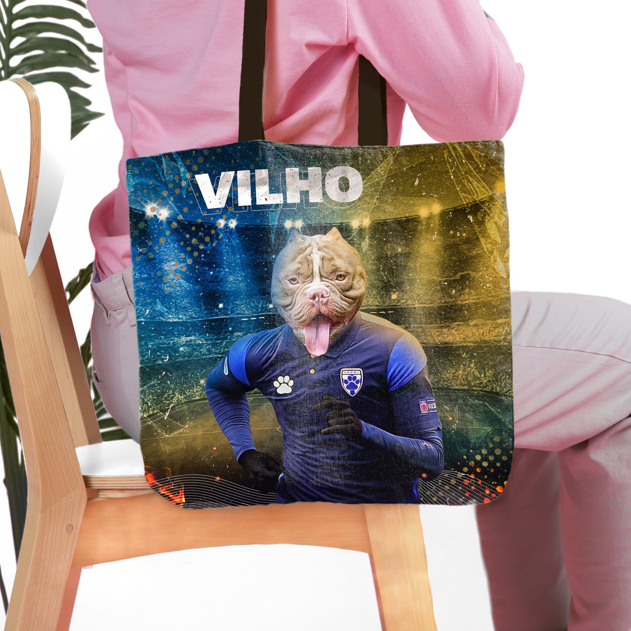 Personalized tote bag with a custom pet portrait of a dog in a blue soccer uniform.