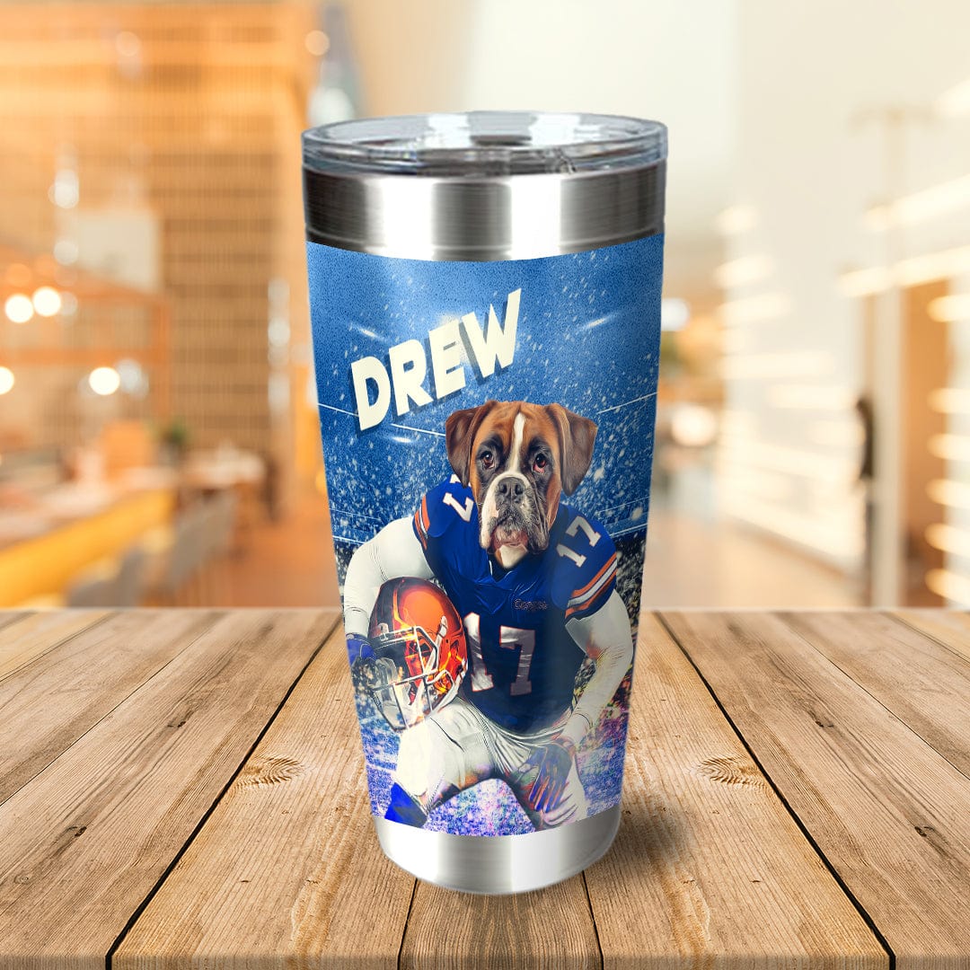 Personalized stainless steel tumbler with a boxer dog in a blue football uniform, helmet, and "DREW" text.