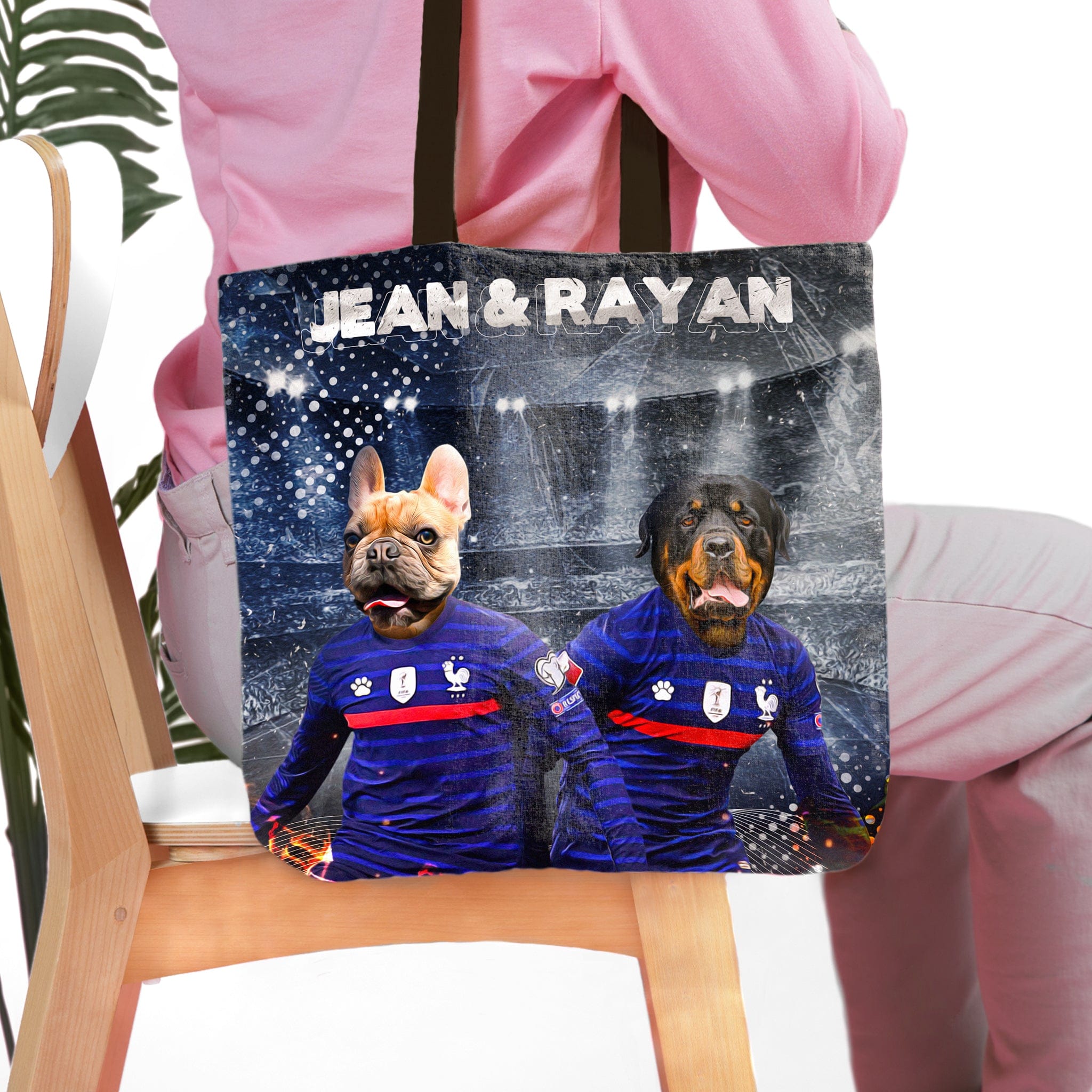 Personalized 2-pet tote bag featuring custom dog portraits of a French Bulldog and Rottweiler in blue soccer jerseys.