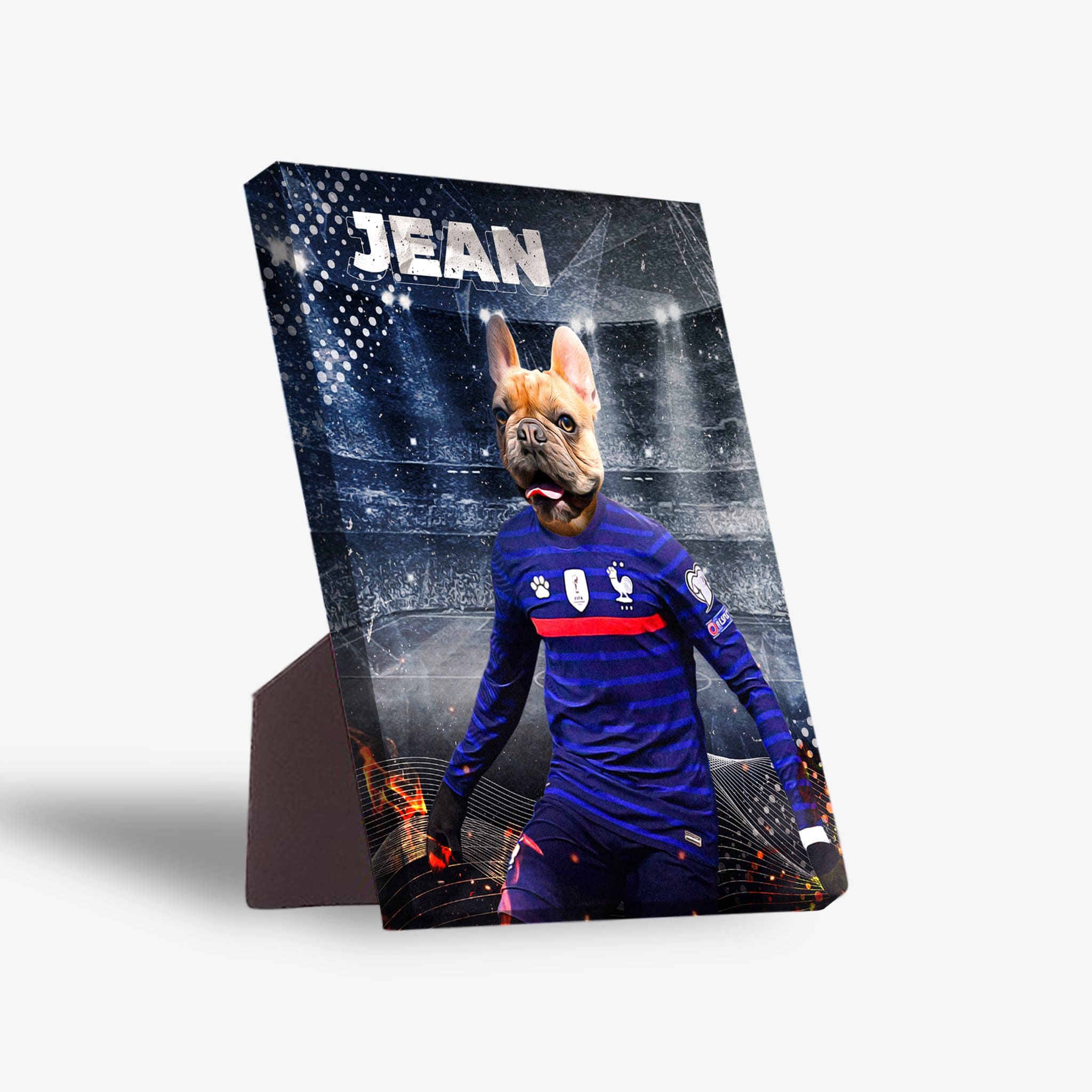 Personalized French Bulldog pet portrait on a standing canvas, wearing a blue France soccer jersey with "JEAN" above.