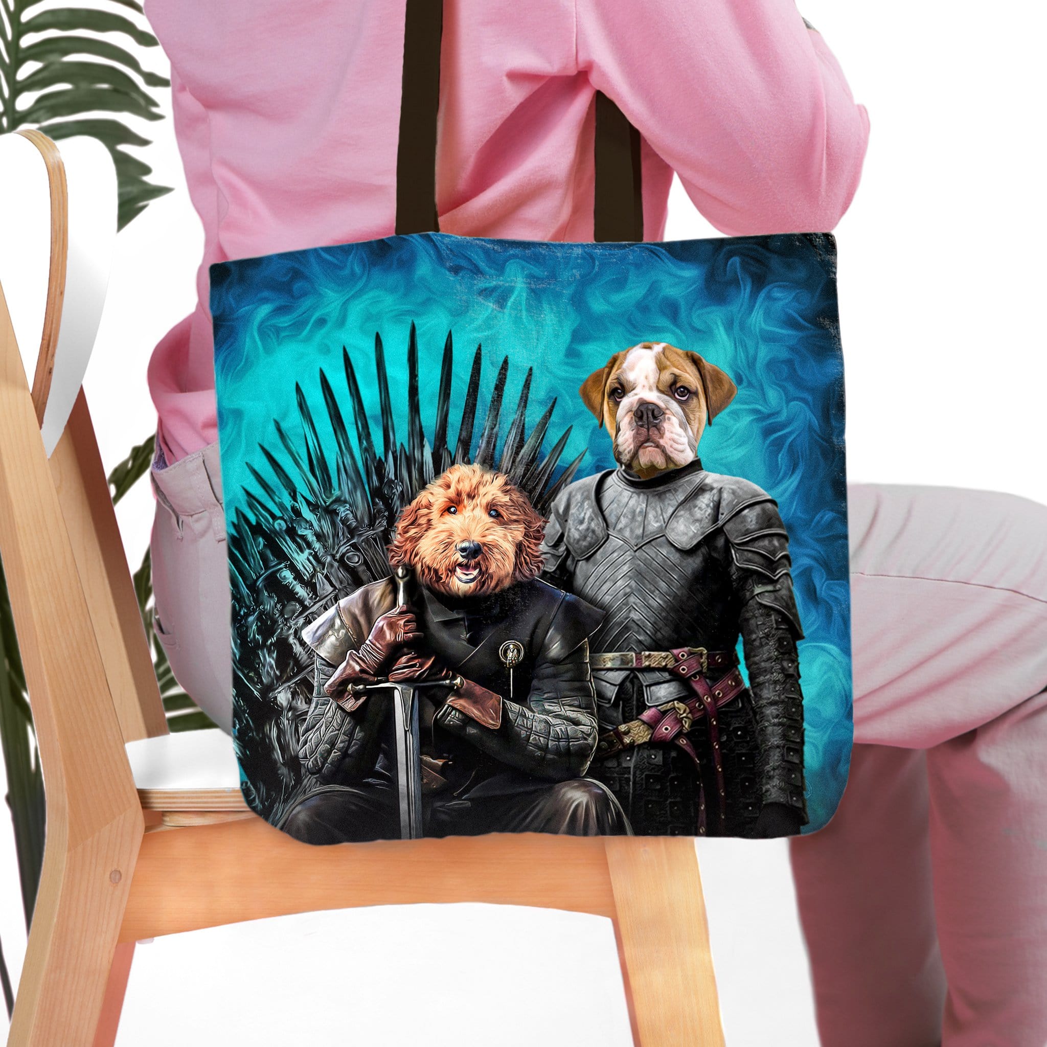 Personalized 2 pet tote bag with dogs in Game of Thrones royal portraits, one on an iron throne.