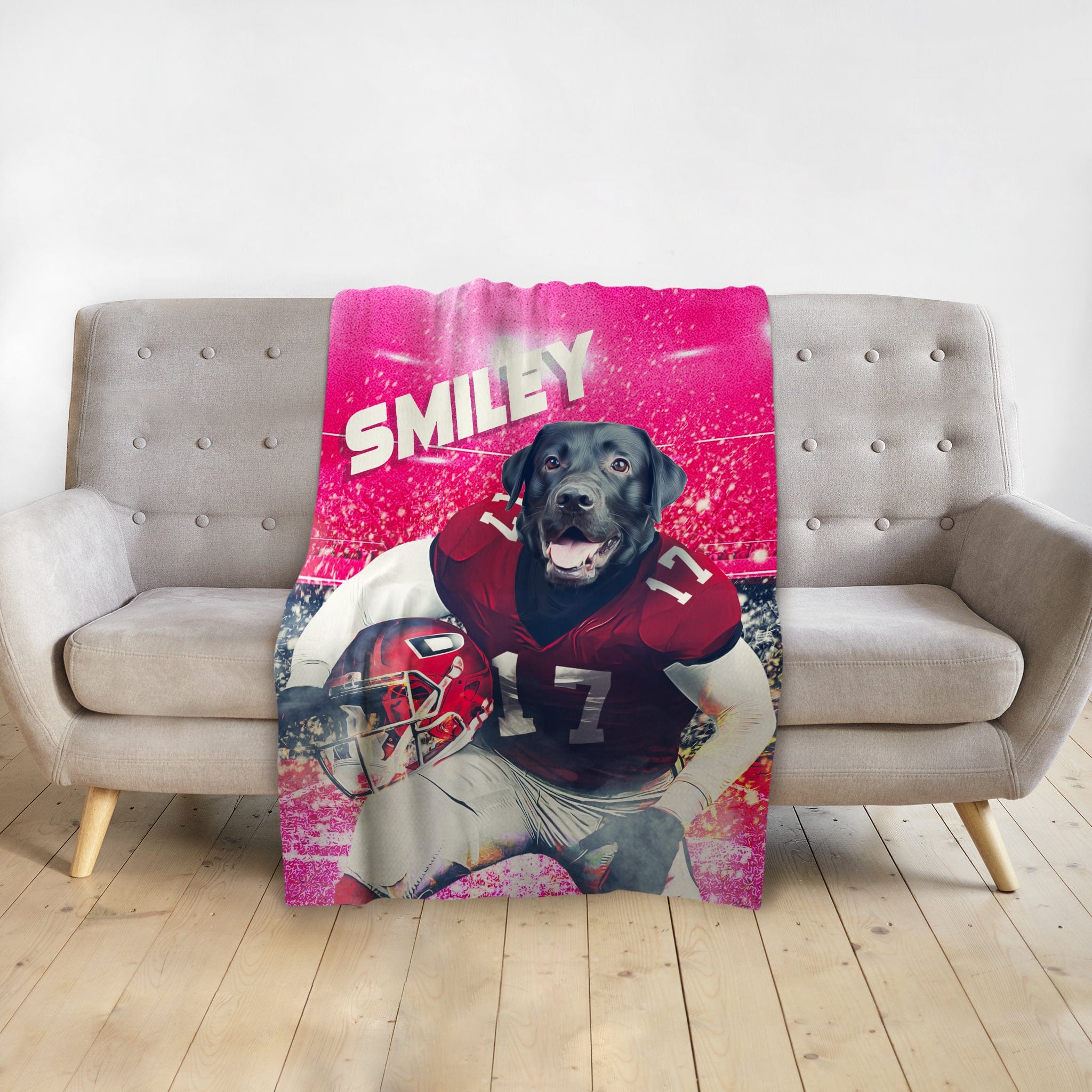 Personalized pet blanket with a black lab dog in a football uniform on a pink stadium background.