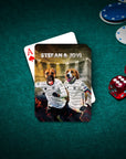 Personalized playing cards featuring two dogs in Germany soccer jerseys on a green felt table.