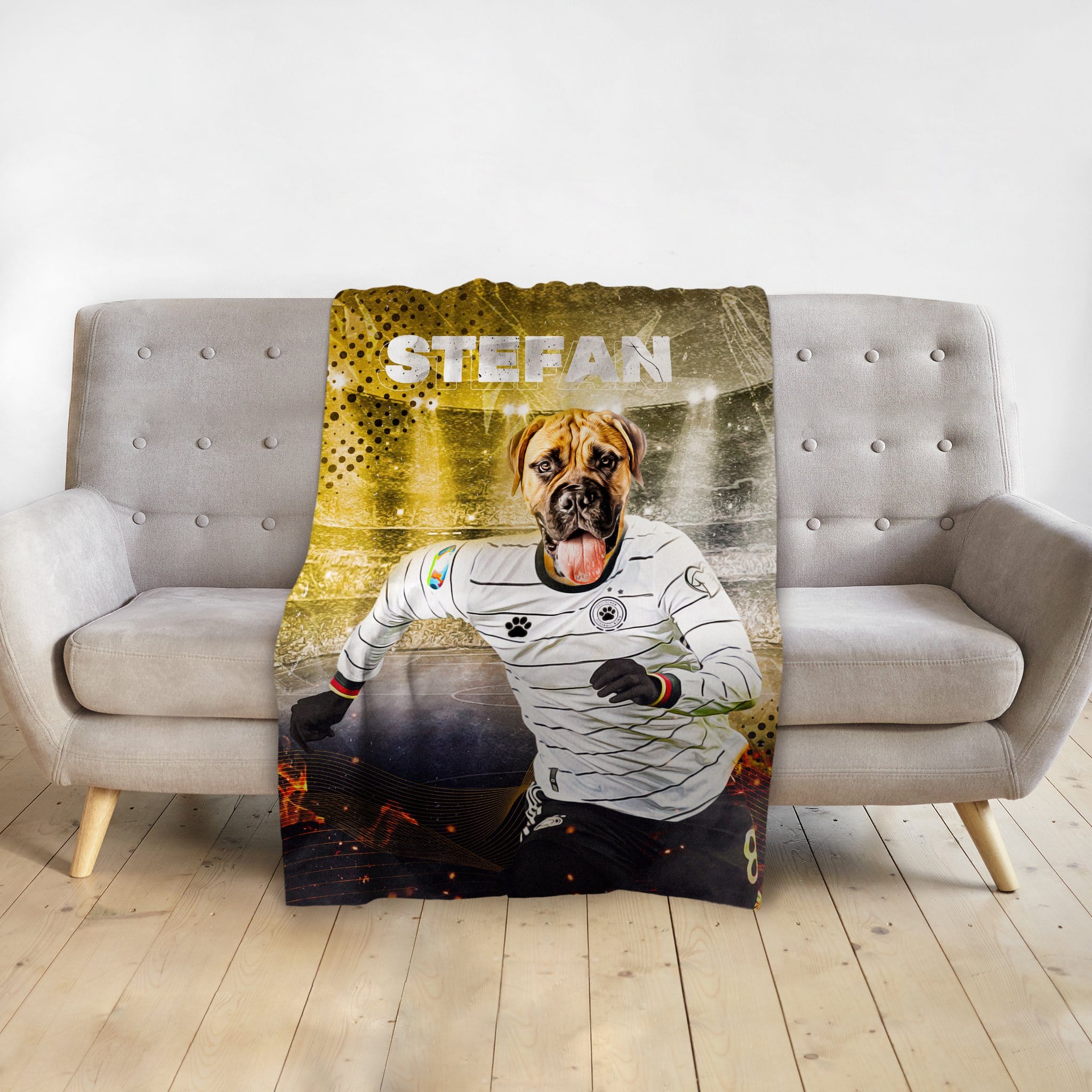 Personalized pet blanket with a Mastiff dog in a Germany soccer uniform, named "Stefan".