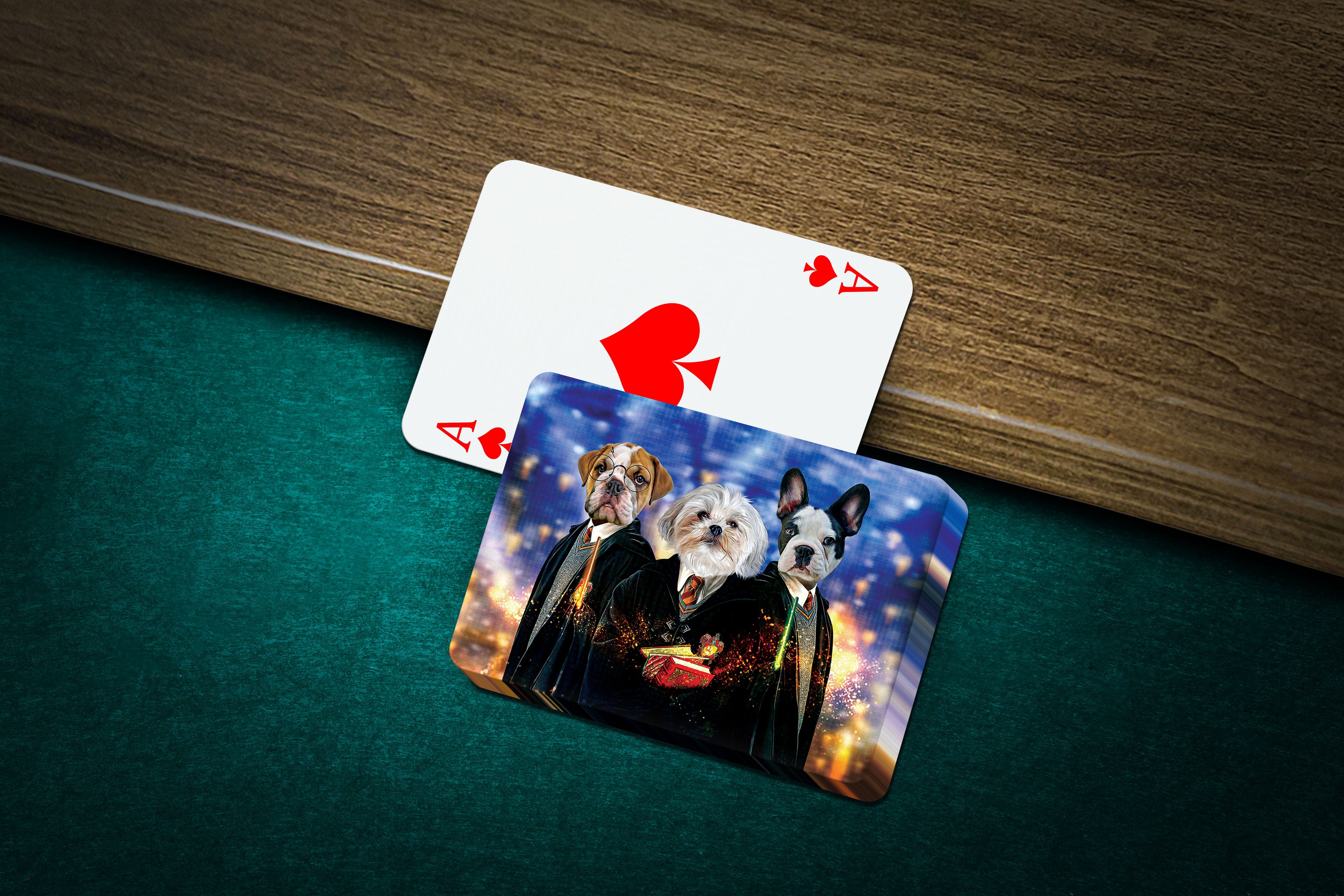 Personalized playing cards featuring three dogs in "Harry Doggers" style, on a green felt table.