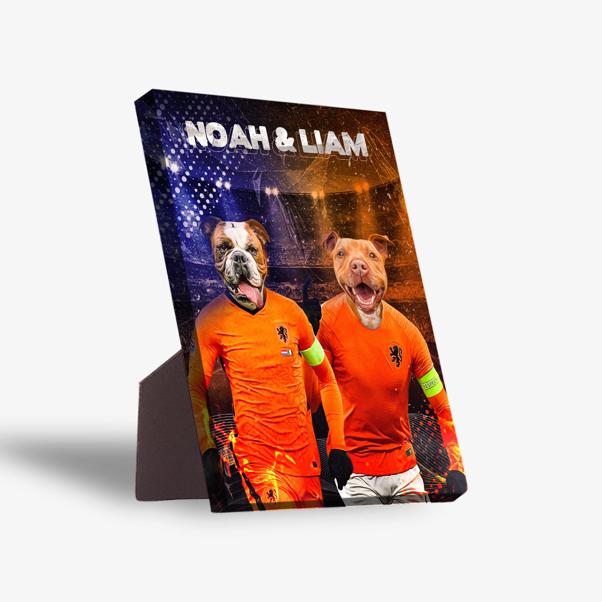 Personalized 2-pet standing canvas featuring dogs in orange Holland soccer jerseys with "Noah & Liam" at the top.