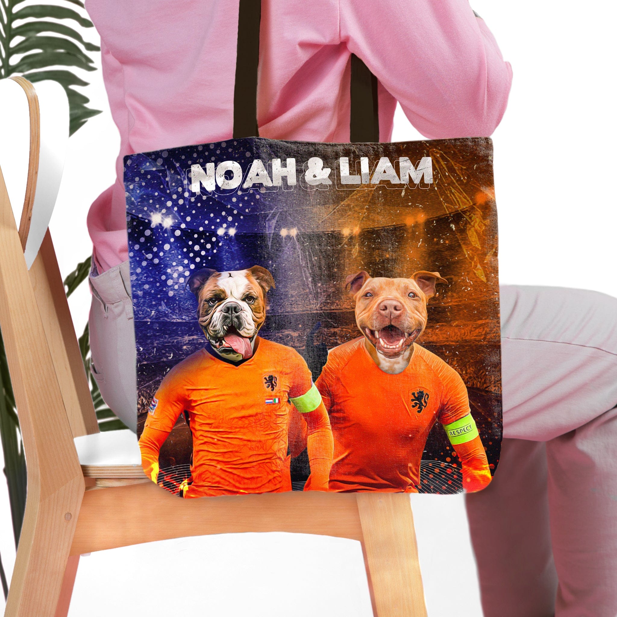 Personalized Holland Doggos tote bag featuring two custom pet portraits of a bulldog and pitbull in orange soccer jerseys.