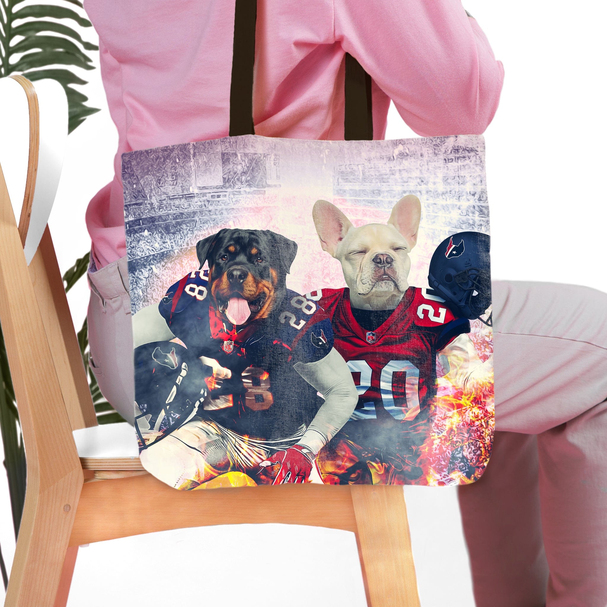 Personalized 'Houston Doggos' tote bag with custom portraits of two dogs in football uniforms.