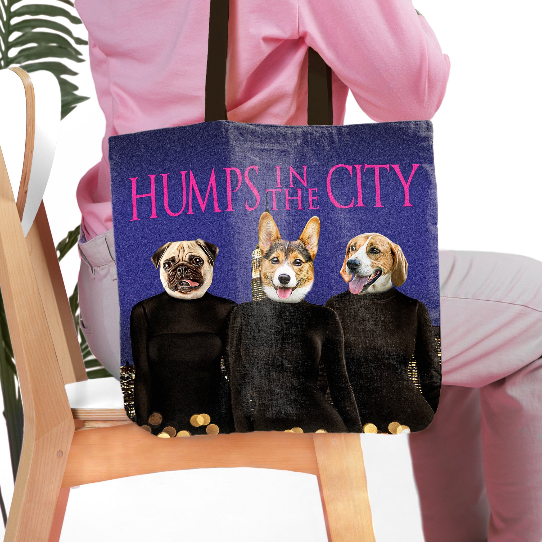 Personalized 3-pet tote bag with cartoon dog portraits in black sweaters against a city skyline.