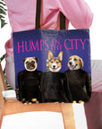 Personalized 3-pet tote bag with cartoon dog portraits in black sweaters against a city skyline.