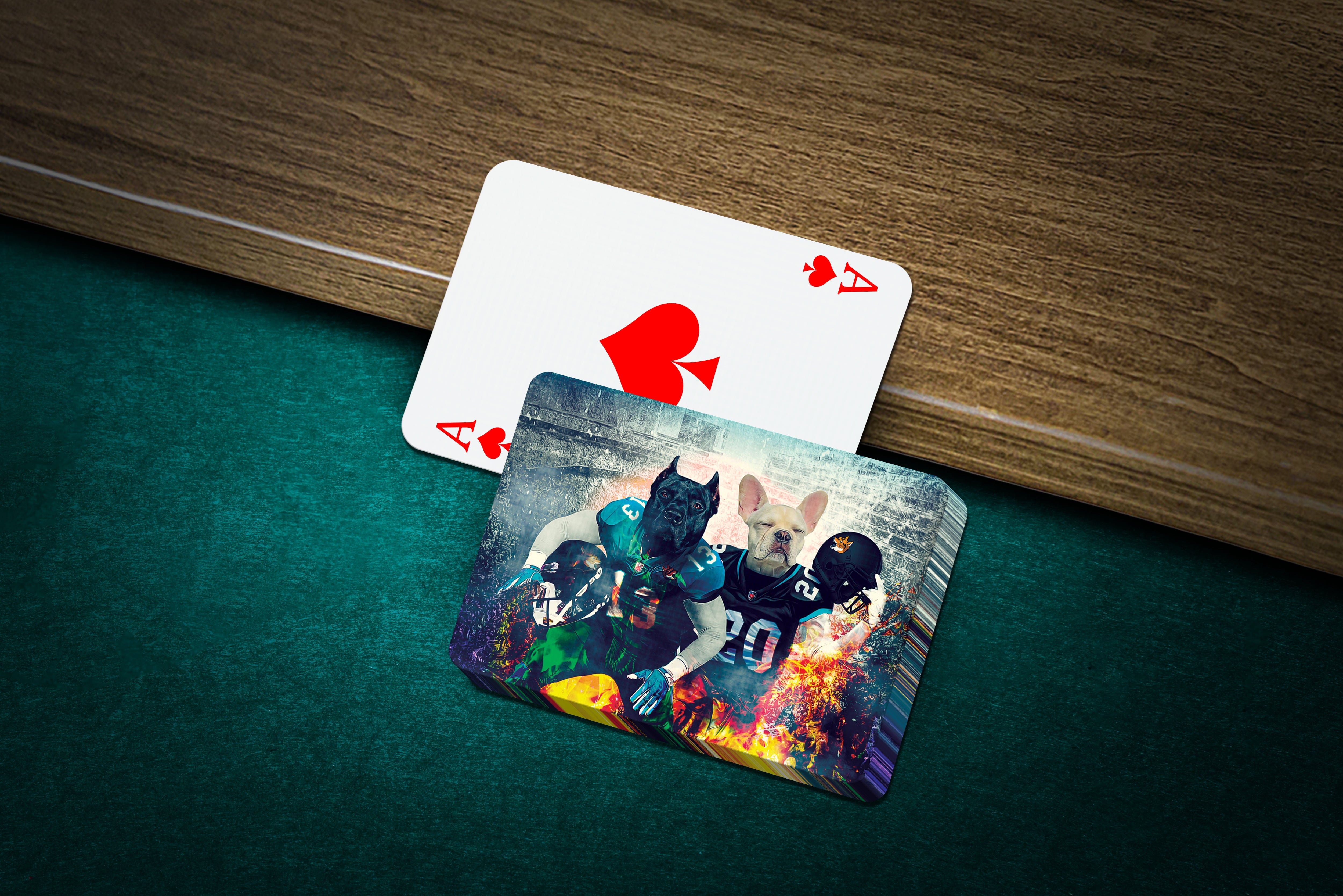 Personalized playing cards featuring two pets as football players, on a green felt table.