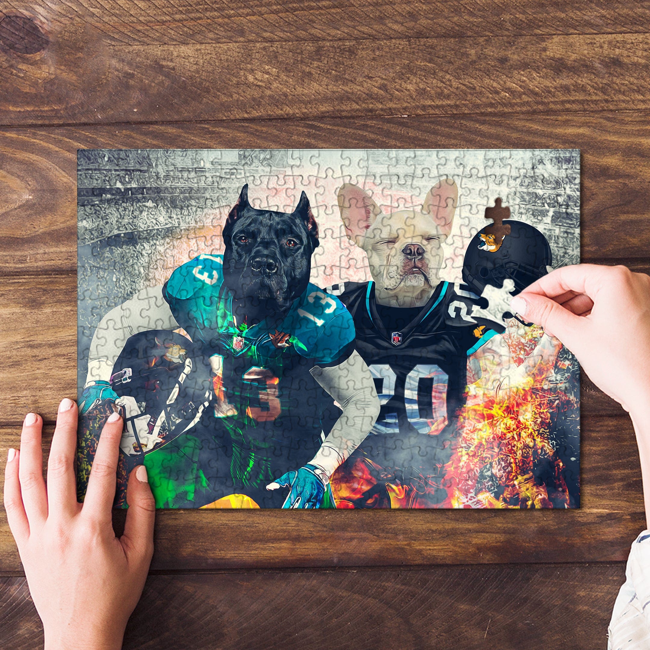 Personalized 2 pet puzzle featuring two dogs in football uniforms, one black and one white, on a wooden table.