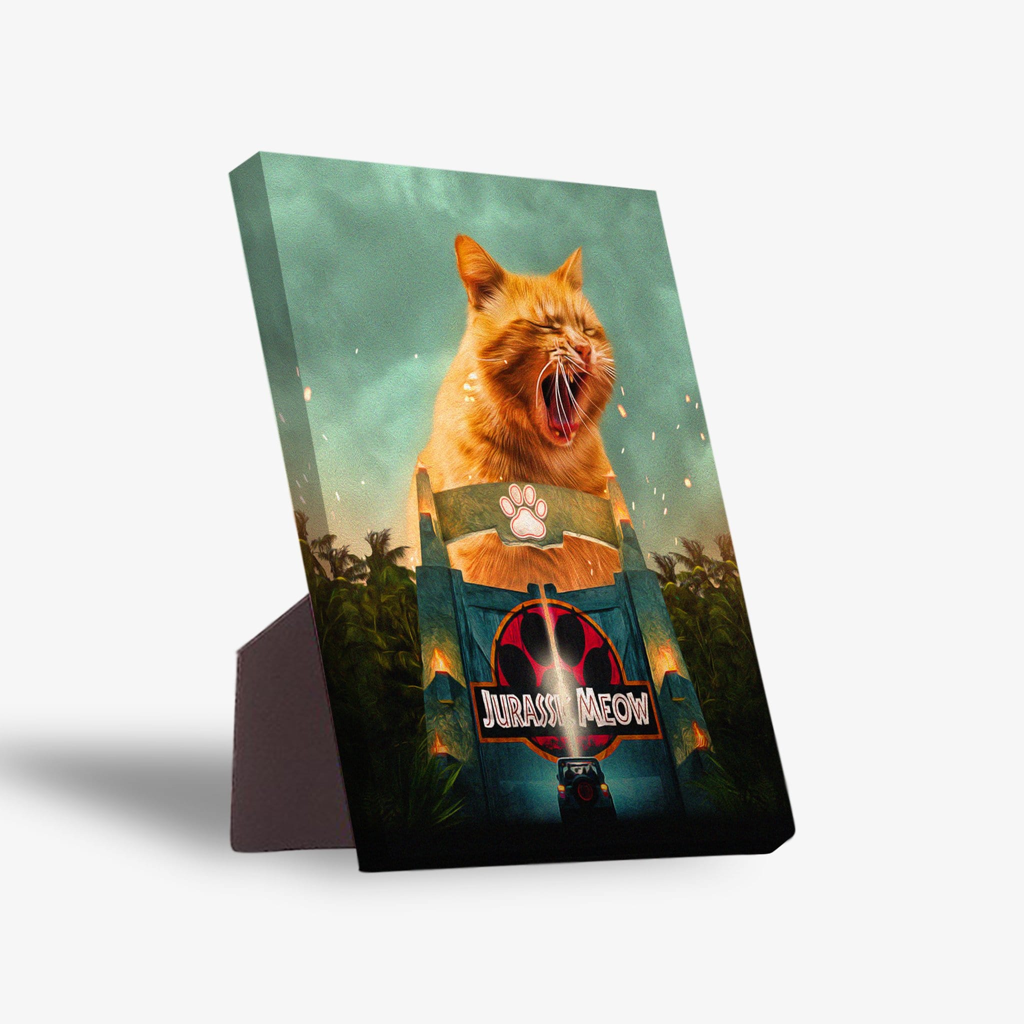 Personalized 'Jurassic Meow' standing canvas featuring a giant yawning orange cat behind a Jurassic Park-style gate.