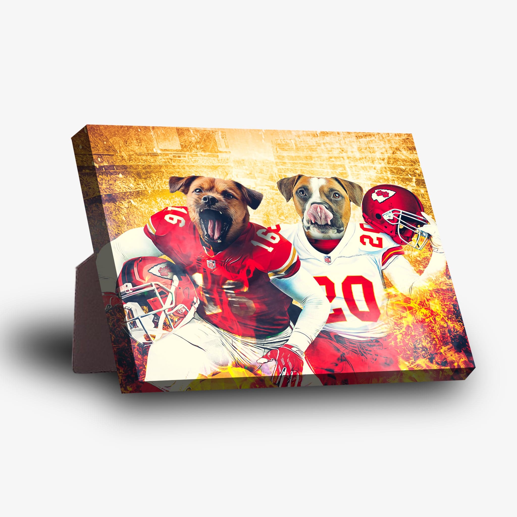 Personalized standing canvas featuring two dogs in red and white football jerseys with helmets, against a fiery stadium background.