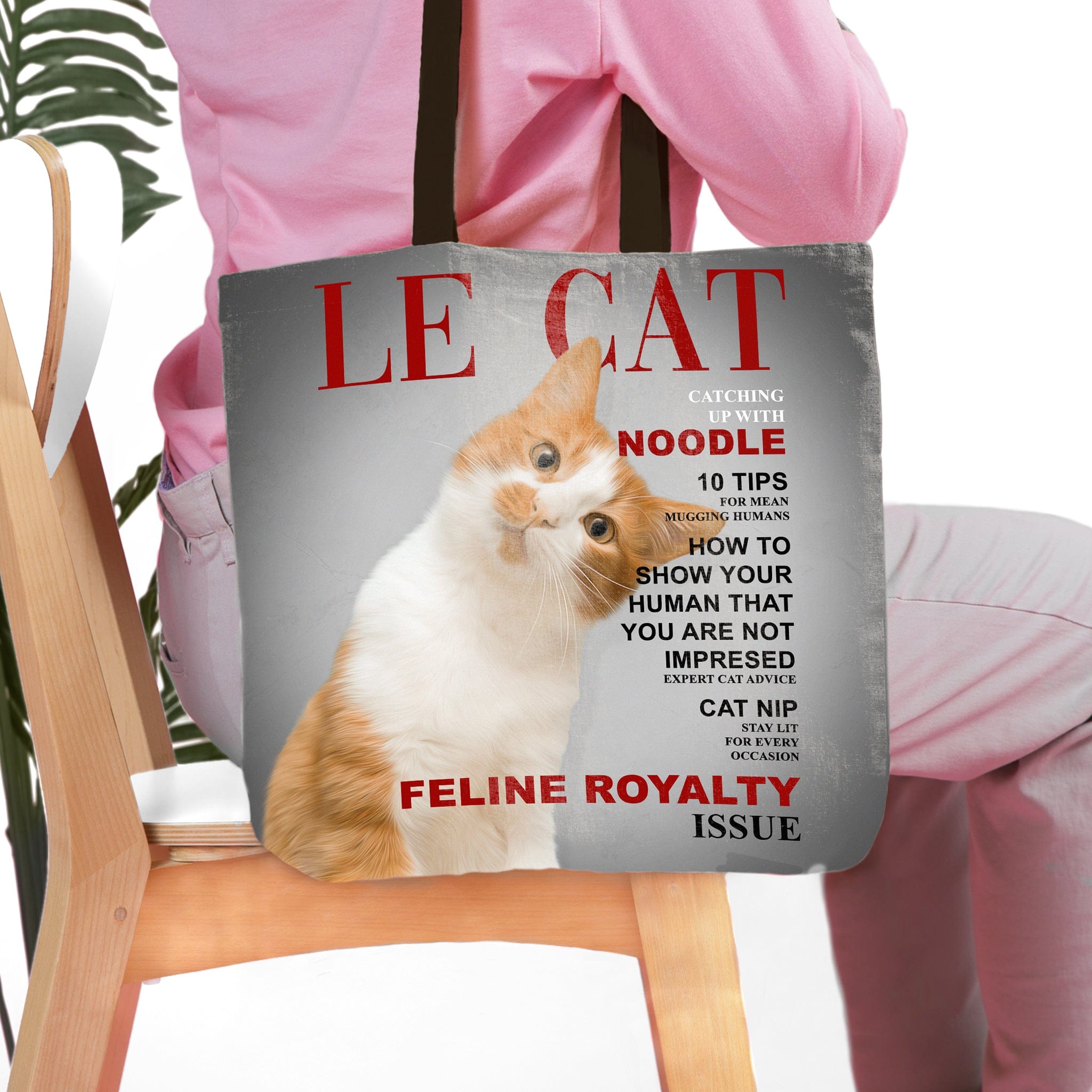 Personalized 'Le Cat' tote bag with a custom portrait of an orange and white cat, designed like a magazine cover.