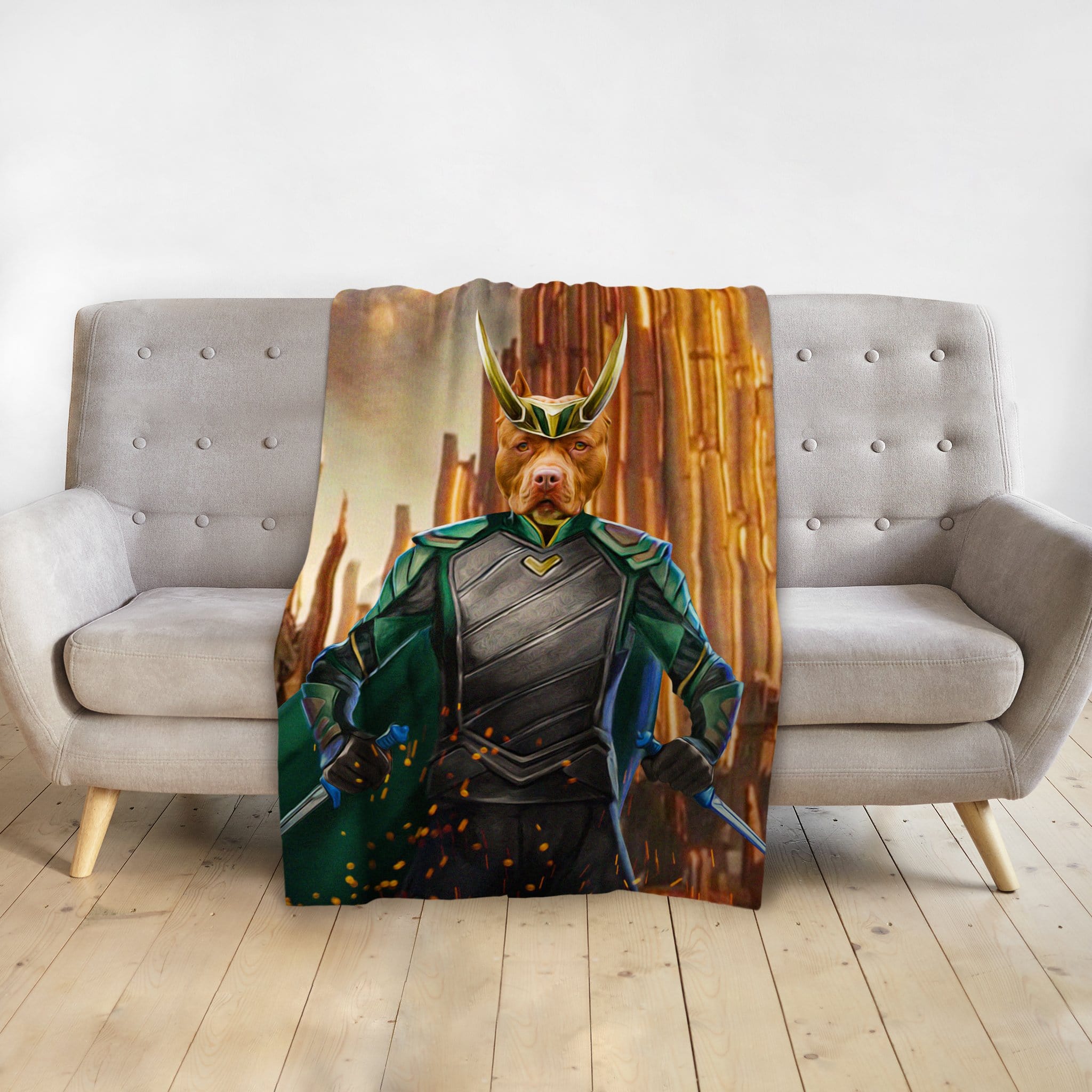 Personalized pet blanket with a Pitbull dog portrait as Loki, draped over a gray couch.