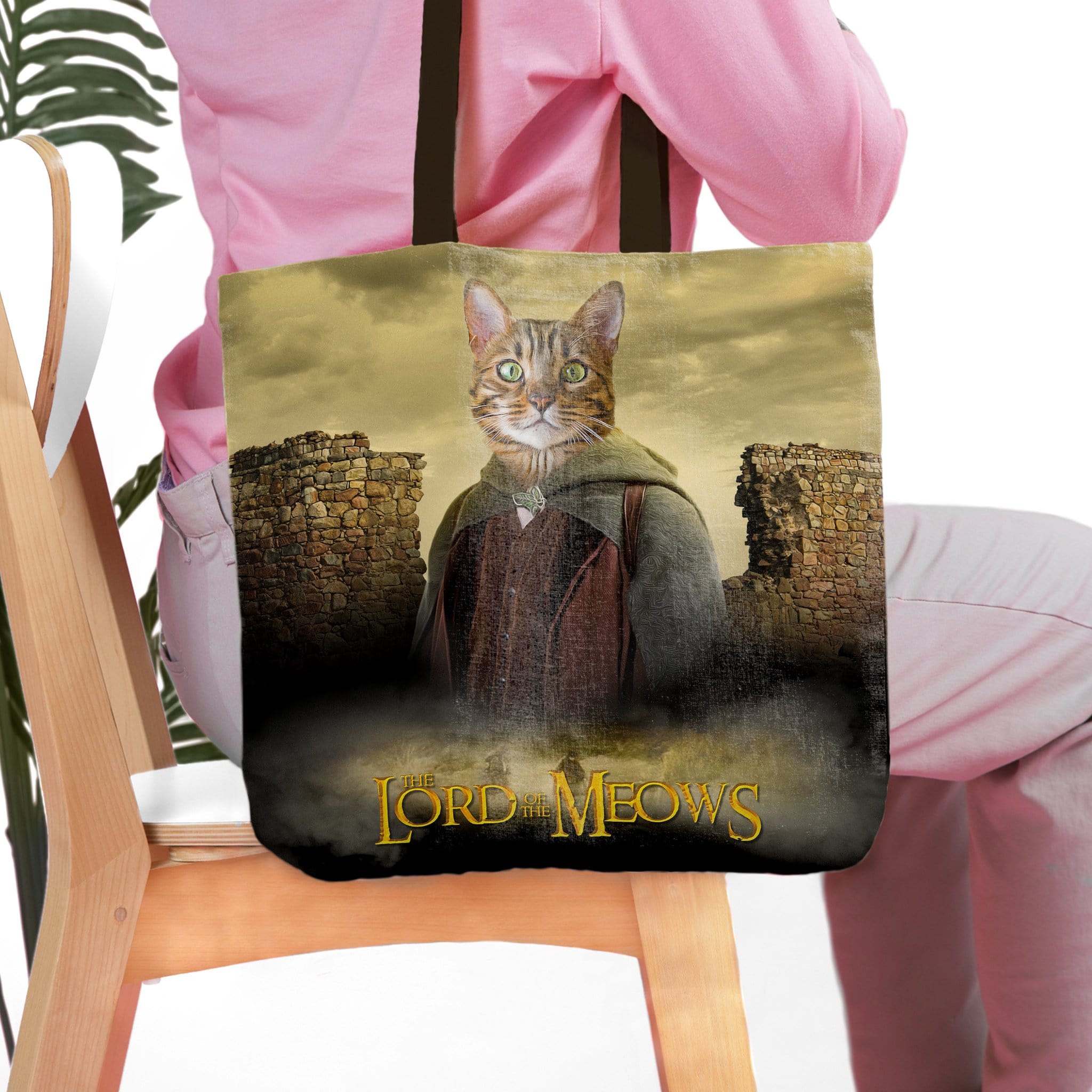 Personalized 'Lord of the Meows' tote bag with a custom cat portrait in a fantasy setting.
