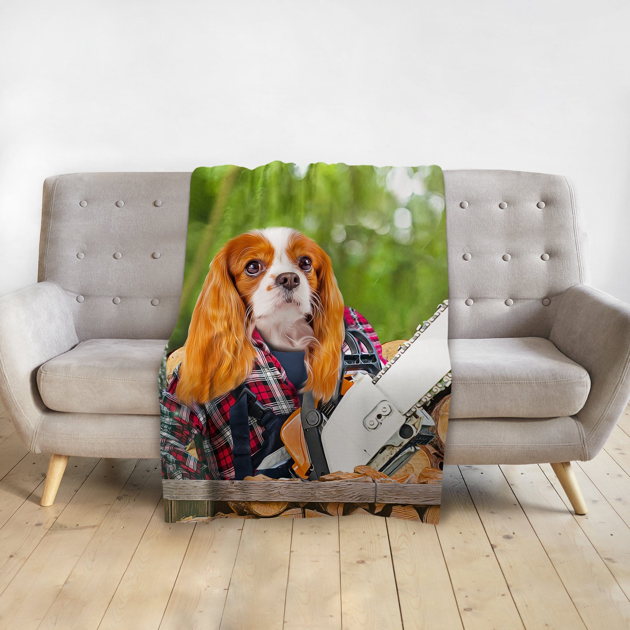 Personalized pet blanket with a Cavalier King Charles Spaniel in a lumberjack outfit holding a chainsaw.